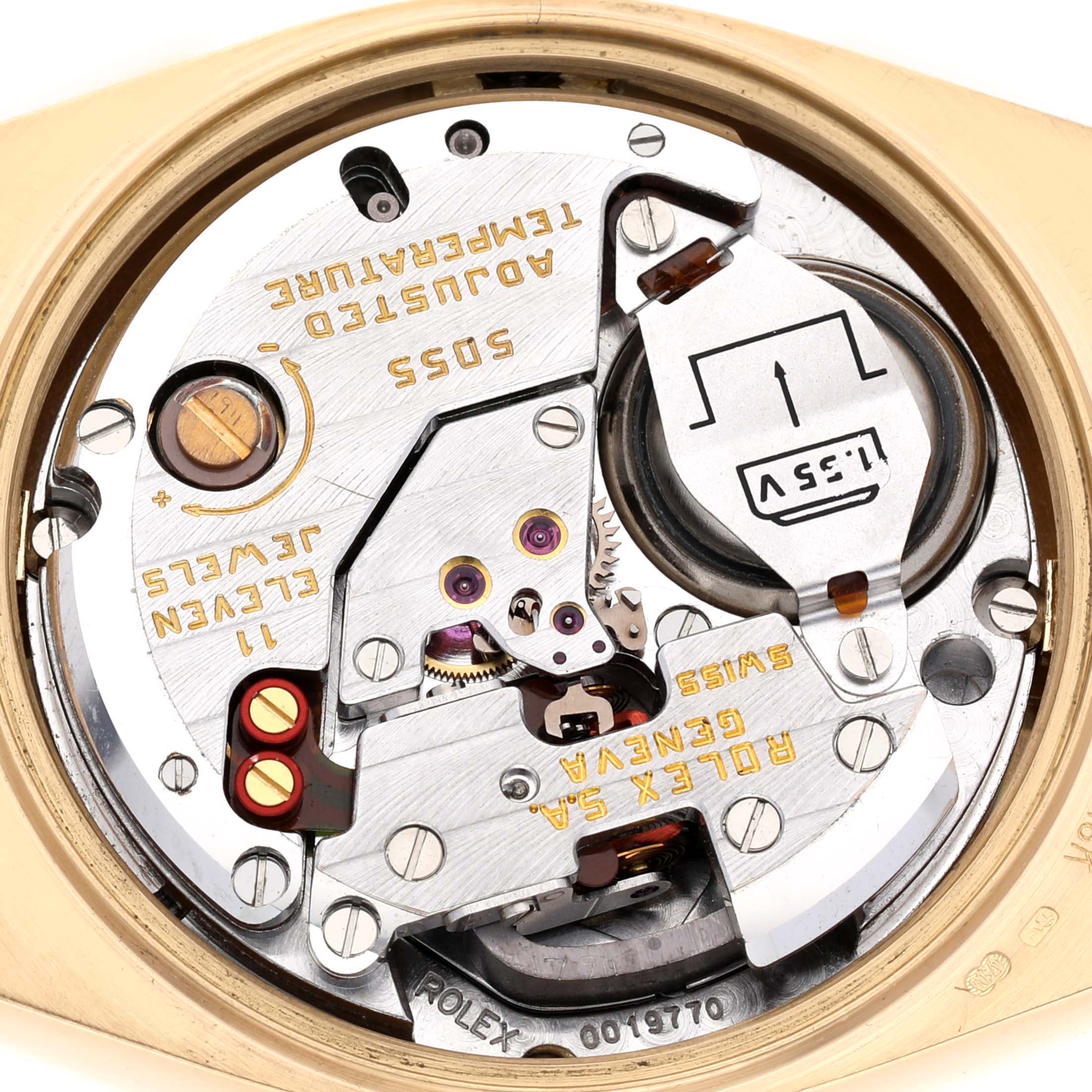 This image displays the movement mechanism of a Rolex Oysterquartz 19018 Men's Yellow Gold Champagne Dial 19018 Men's Yellow Gold Champagne Dial watch from a top-down angle.