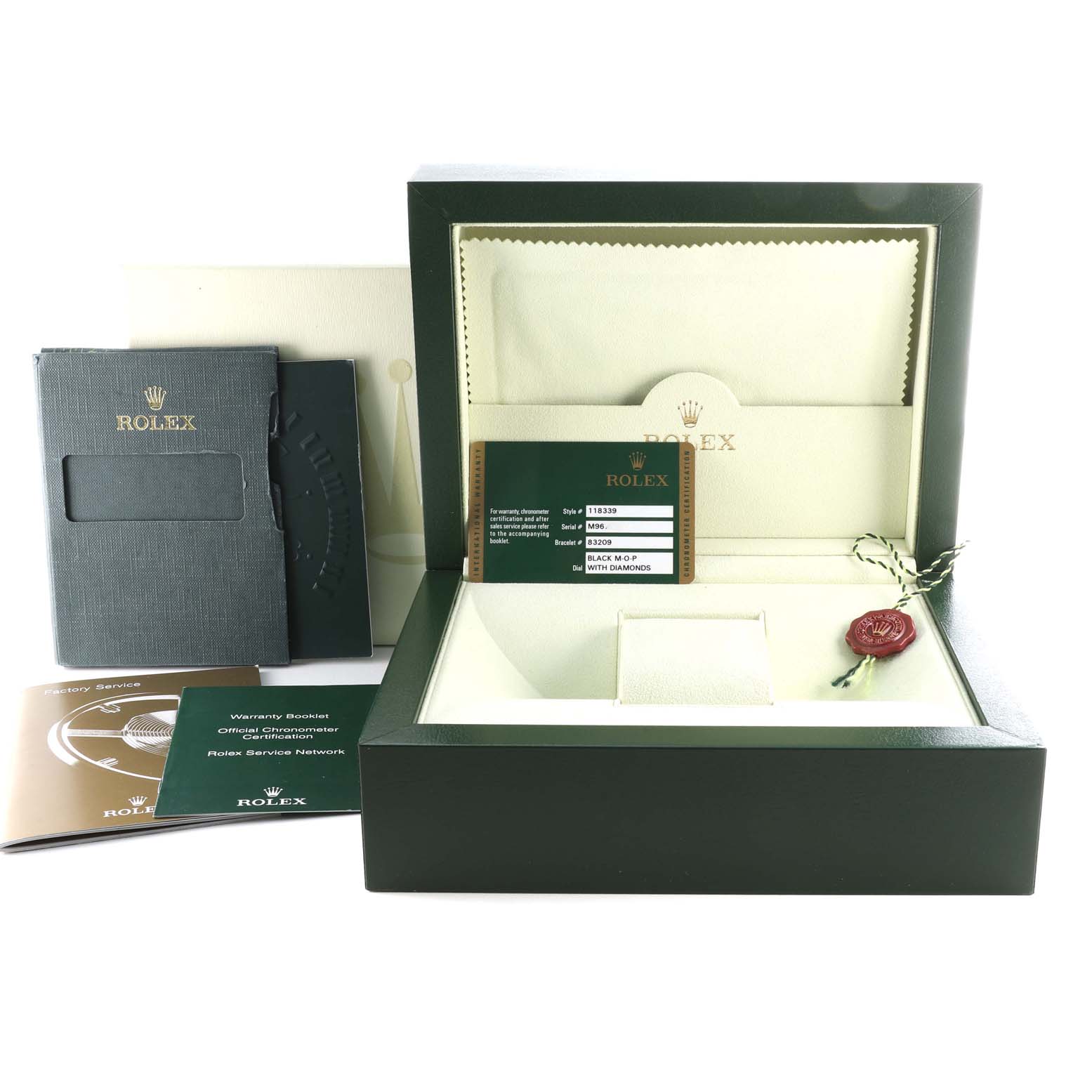 This image shows the packaging, warranty booklets, and accessories for a Rolex President 118339 Men's White Gold Mother of Pearl Dial 118339 Men's White Gold Mother of Pearl Dial model watch.