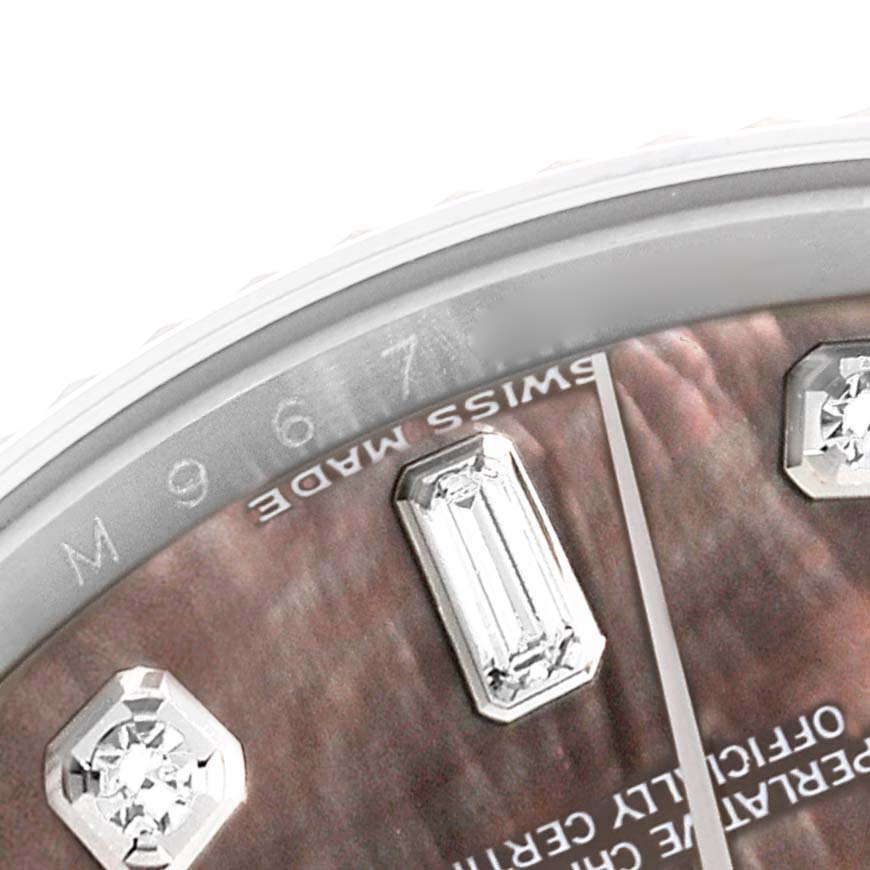 This close-up angle of the Rolex President 118339 Men's White Gold Mother of Pearl Dial 118339 Men's White Gold Mother of Pearl Dial watch shows the dial with diamond markers and part of the bezel.