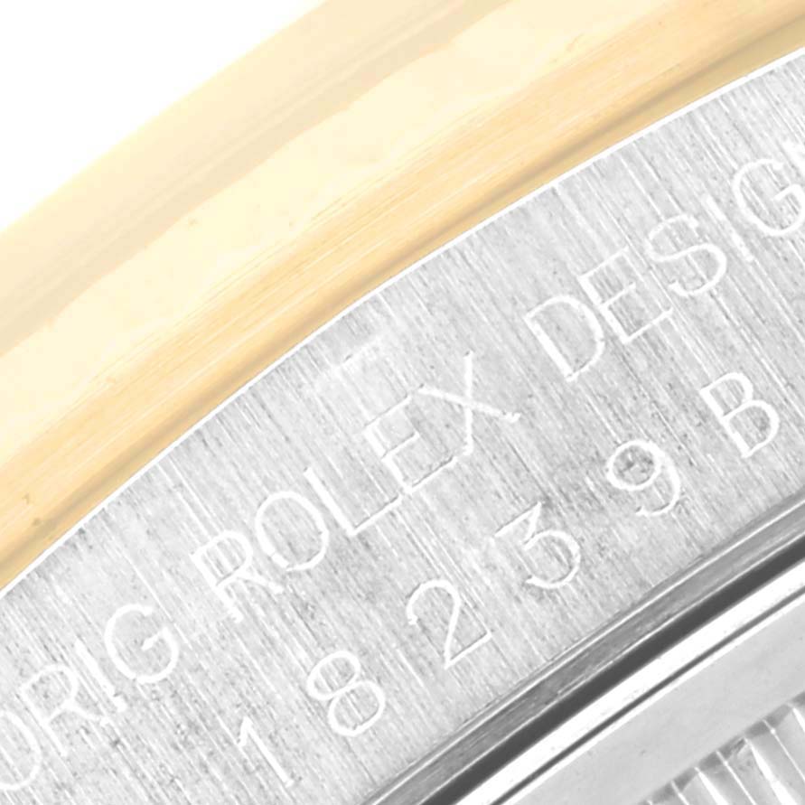Close-up of the bevel and engraved details on a Rolex President 18239BIC Men's White Gold Silver Dial 18239BIC Men's White Gold Silver Dial model watch.