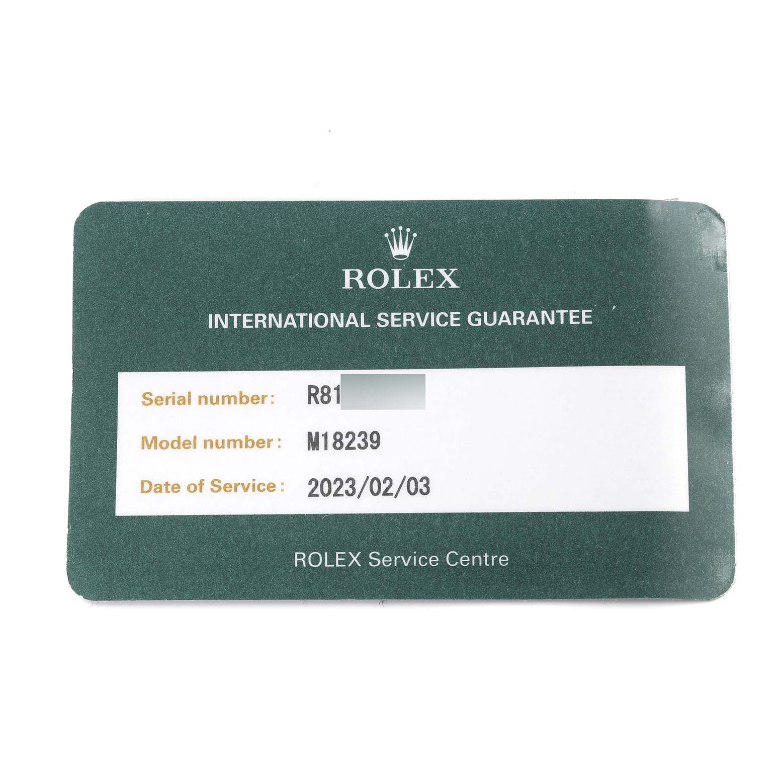 This image shows a Rolex International Service Guarantee card for the President model M18239.