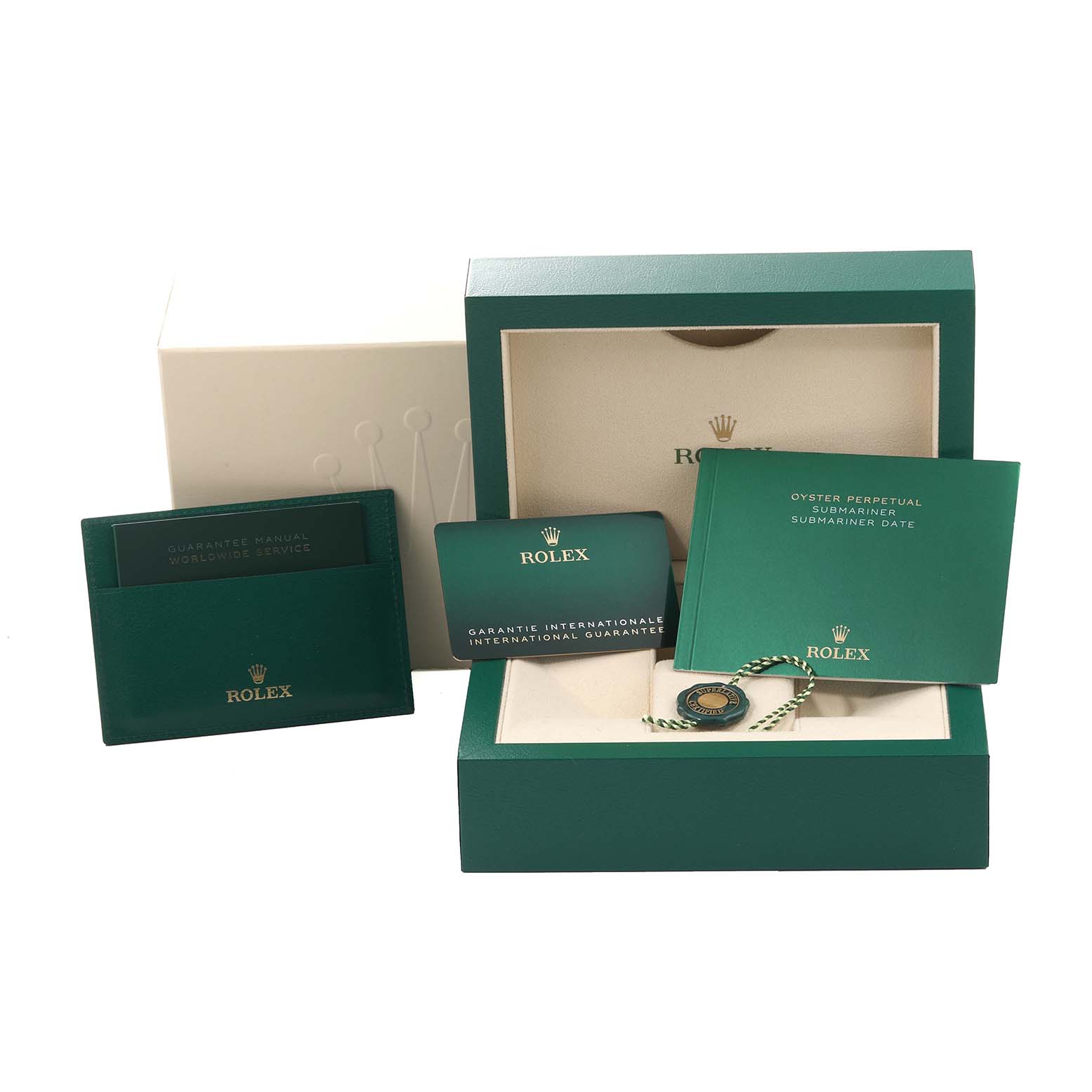The image shows the packaging and accessories of a Rolex Submariner 126613LB Men's Steel and Gold (two tone) Blue Dial 126613LB Men's Steel and Gold (two tone) Blue Dial, including a box, manual, international guarantee, and hang tag.