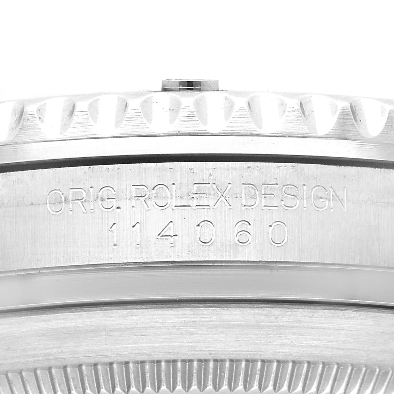 This image shows a close-up of the engraving on the side of a Rolex Submariner 114060 Men
s Stainless Steel Black Dial 114060 Men
s Stainless Steel Black Dial watch, highlighting the model number 114060.