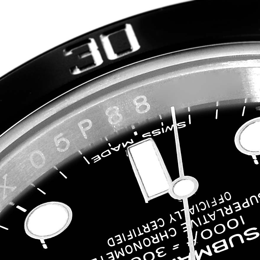 The image shows a close-up of the dial and bezel of a Rolex Submariner 114060 Men
s Stainless Steel Black Dial 114060 Men
s Stainless Steel Black Dial watch, highlighting the 30-minute marker.