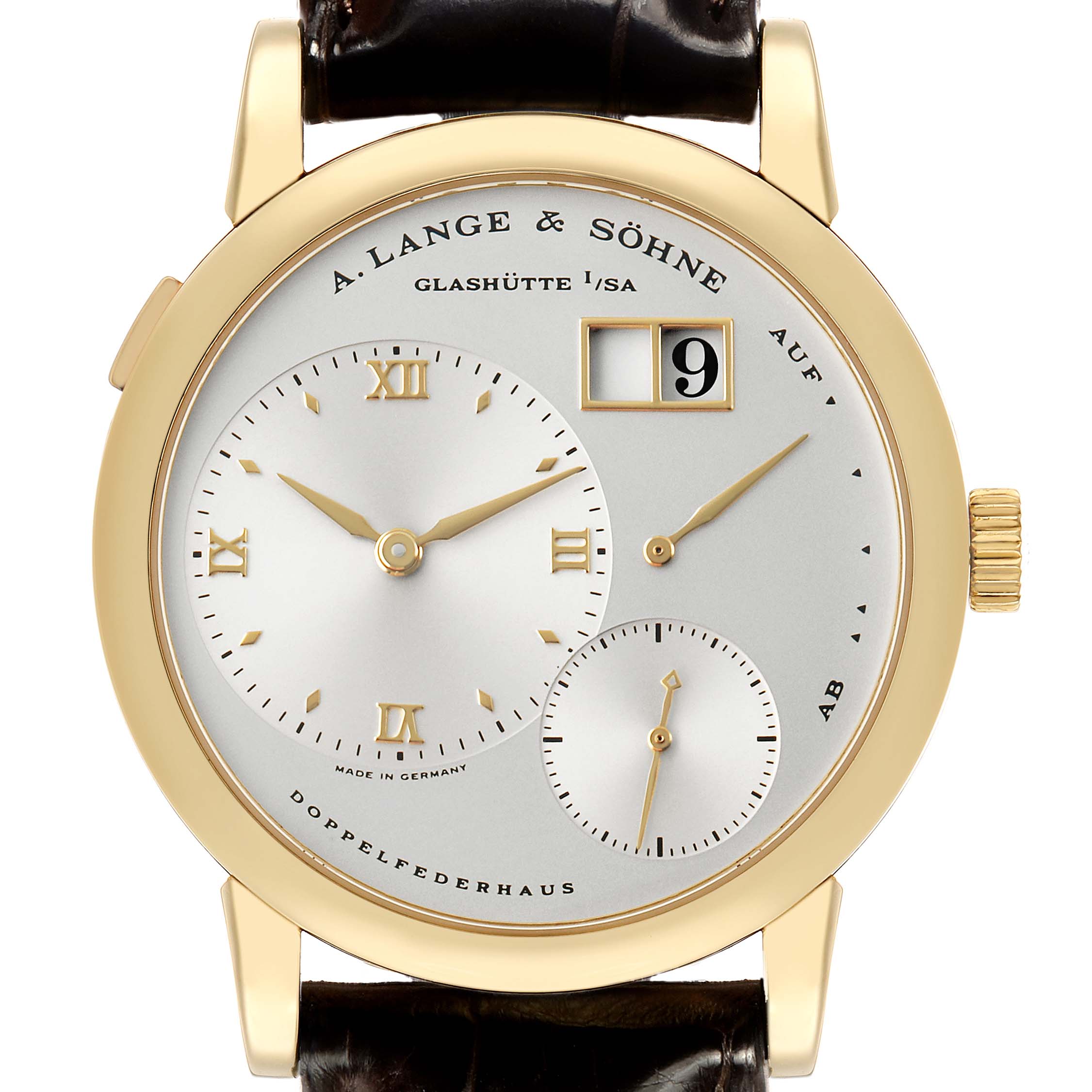 The Lange 1 by A. Lange & Söhne is shown head-on, featuring the dial, hands, date window, and brown strap.