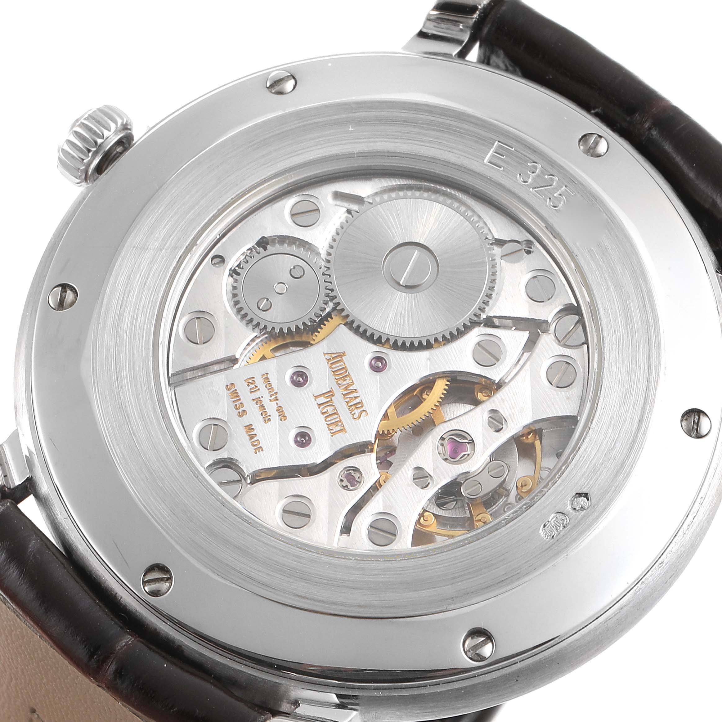 The image shows the case back and movement of the Audemars Piguet Jules 15056BC.OO.0001CR.01 Men's White Gold Silver Dial 15056BC.OO.0001CR.01 Men's White Gold Silver Dial model watch at an angle, revealing gears and intricate details.