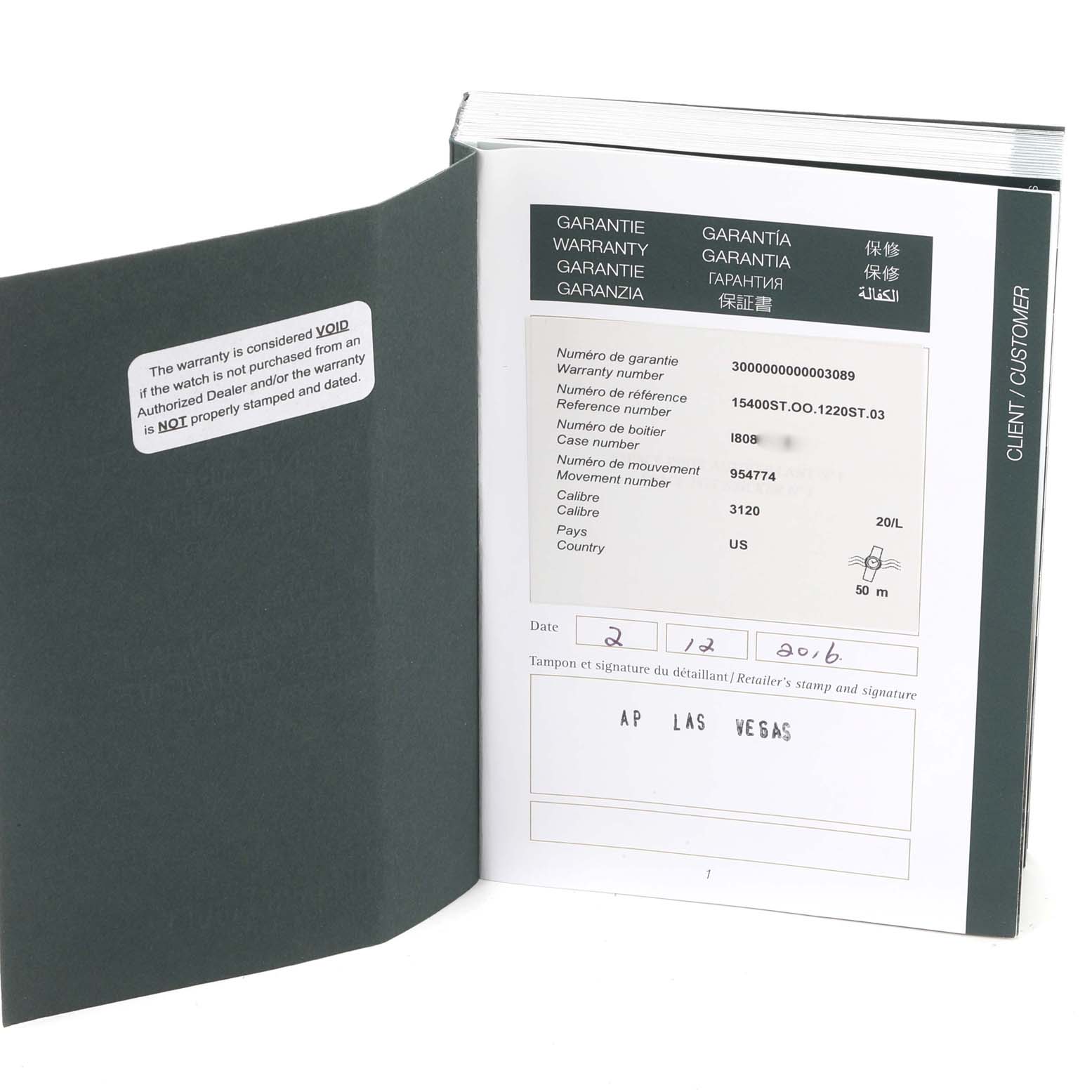 The image shows the warranty booklet for the Audemars Piguet Royal Oak 15400ST.OO.1220ST.03 Men's Stainless Steel Blue Dial 15400ST.OO.1220ST.03 Men's Stainless Steel Blue Dial watch, open to a page detailing the warranty information.