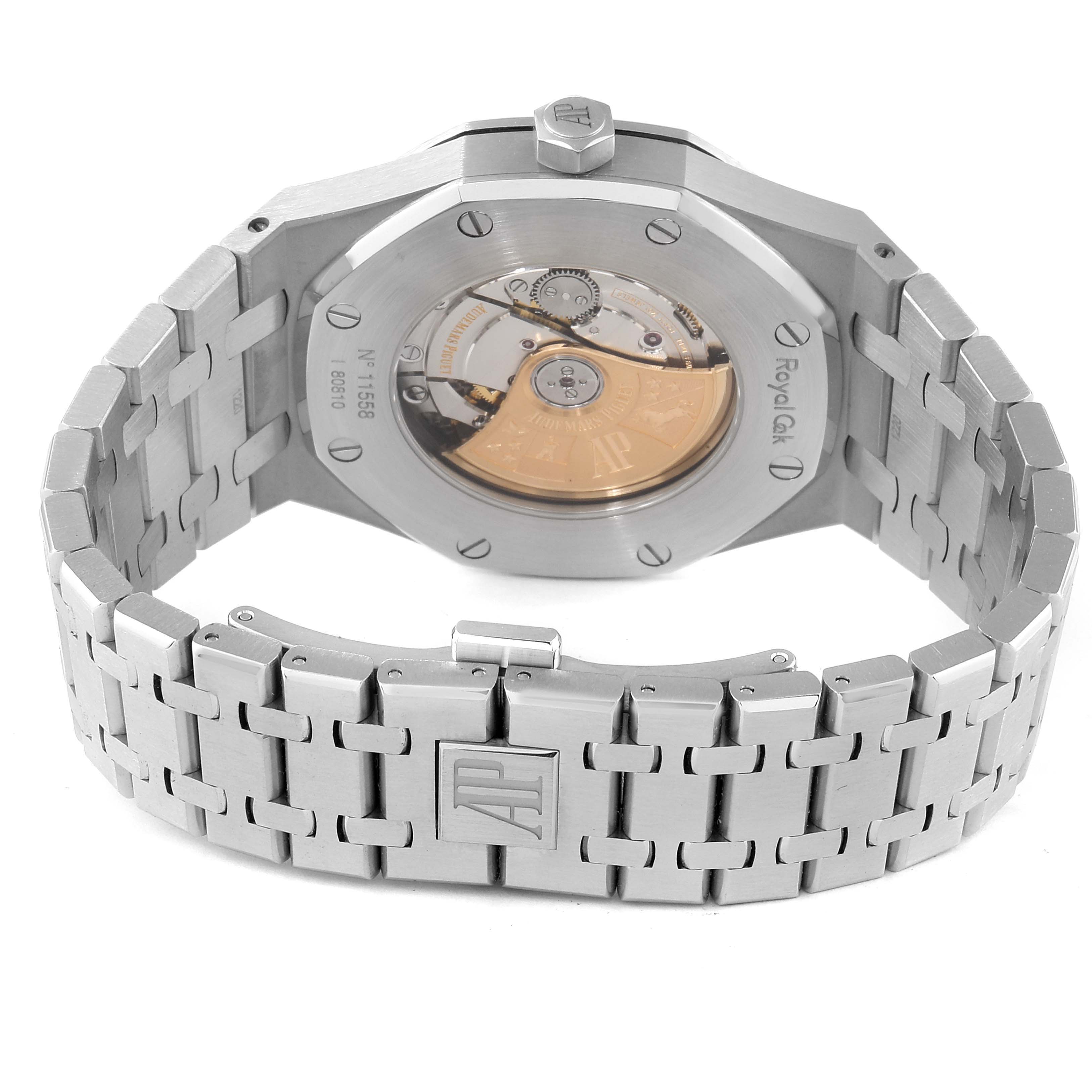 The image shows the back view of a Royal Oak model by Audemars Piguet, displaying its open case back and metal bracelet.