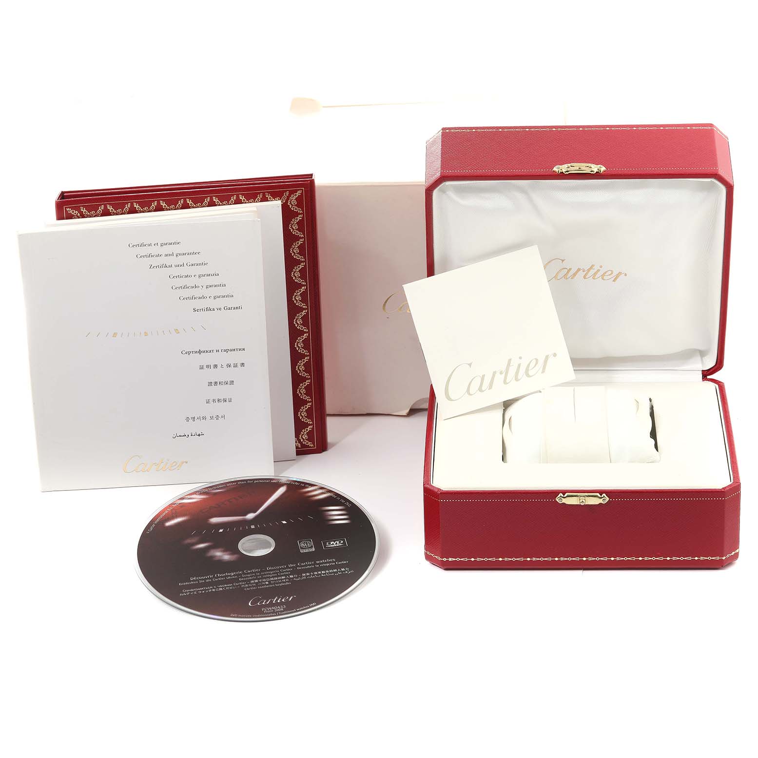 The image shows the packaging and accessories for a Calibre de Cartier watch, including a red box, manuals, and a CD.