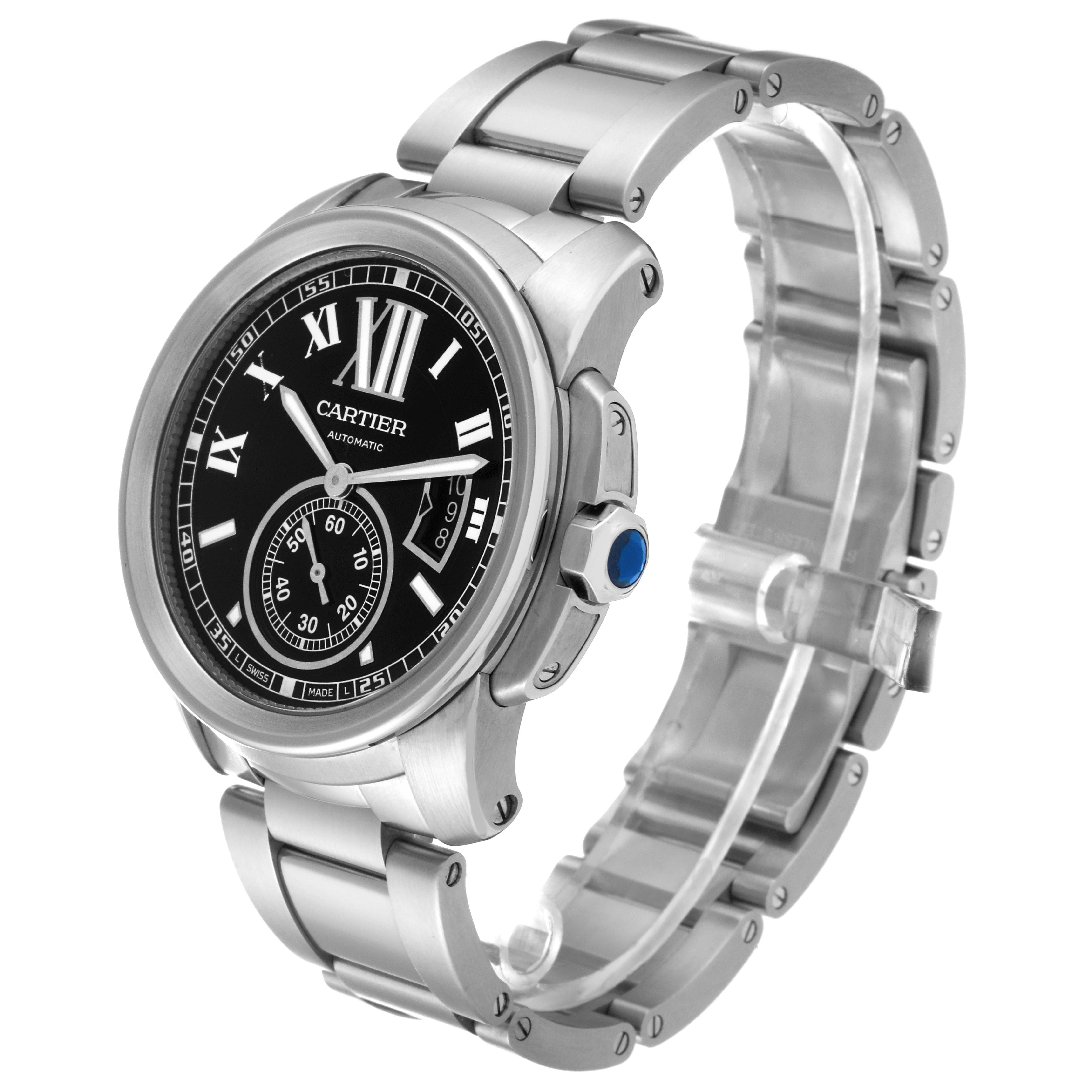 The image shows a Calibre de Cartier watch by Cartier at a three-quarter angle showcasing the dial, bezel, crown, and bracelet.