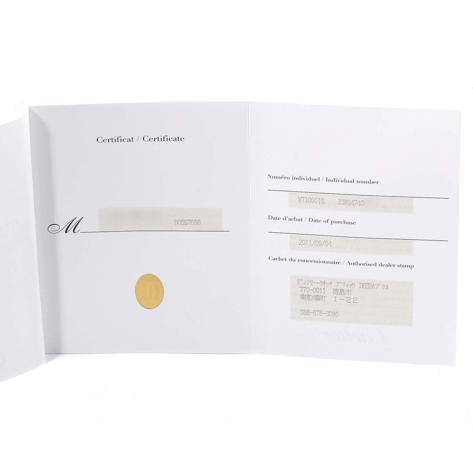 This image shows a certification booklet for the Calibre de Cartier model by Cartier, including purchase details and stamps.