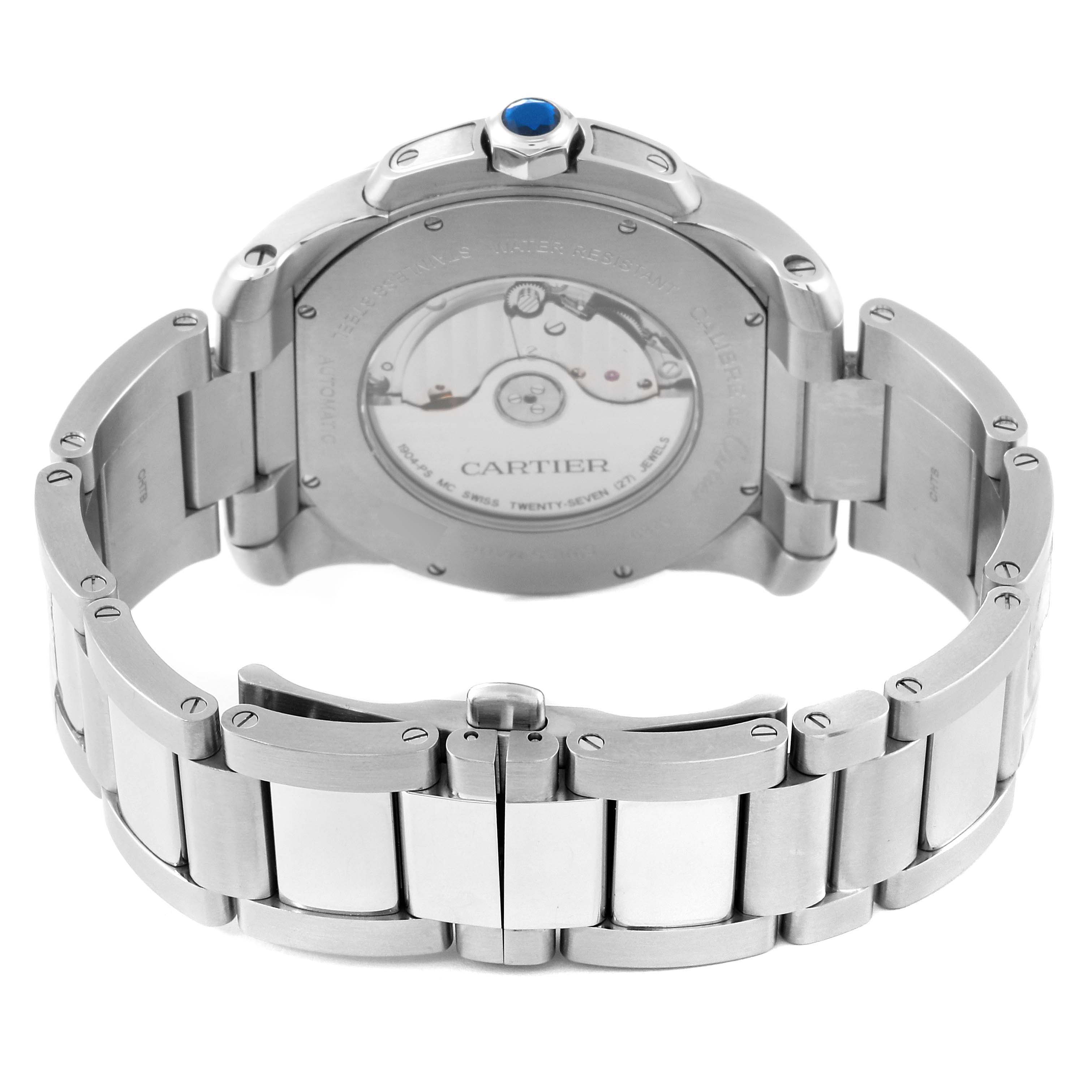 The image shows the back view of a Calibre de Cartier watch by Cartier, highlighting its metallic band and transparent case back.