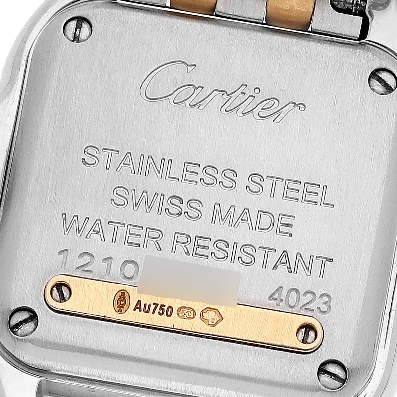 This image shows the back case of a Cartier Panthere W2PN0006 Women's Steel and Gold (two tone) Silver Dial W2PN0006 Women's Steel and Gold (two tone) Silver Dial watch, featuring its engravings and markings.