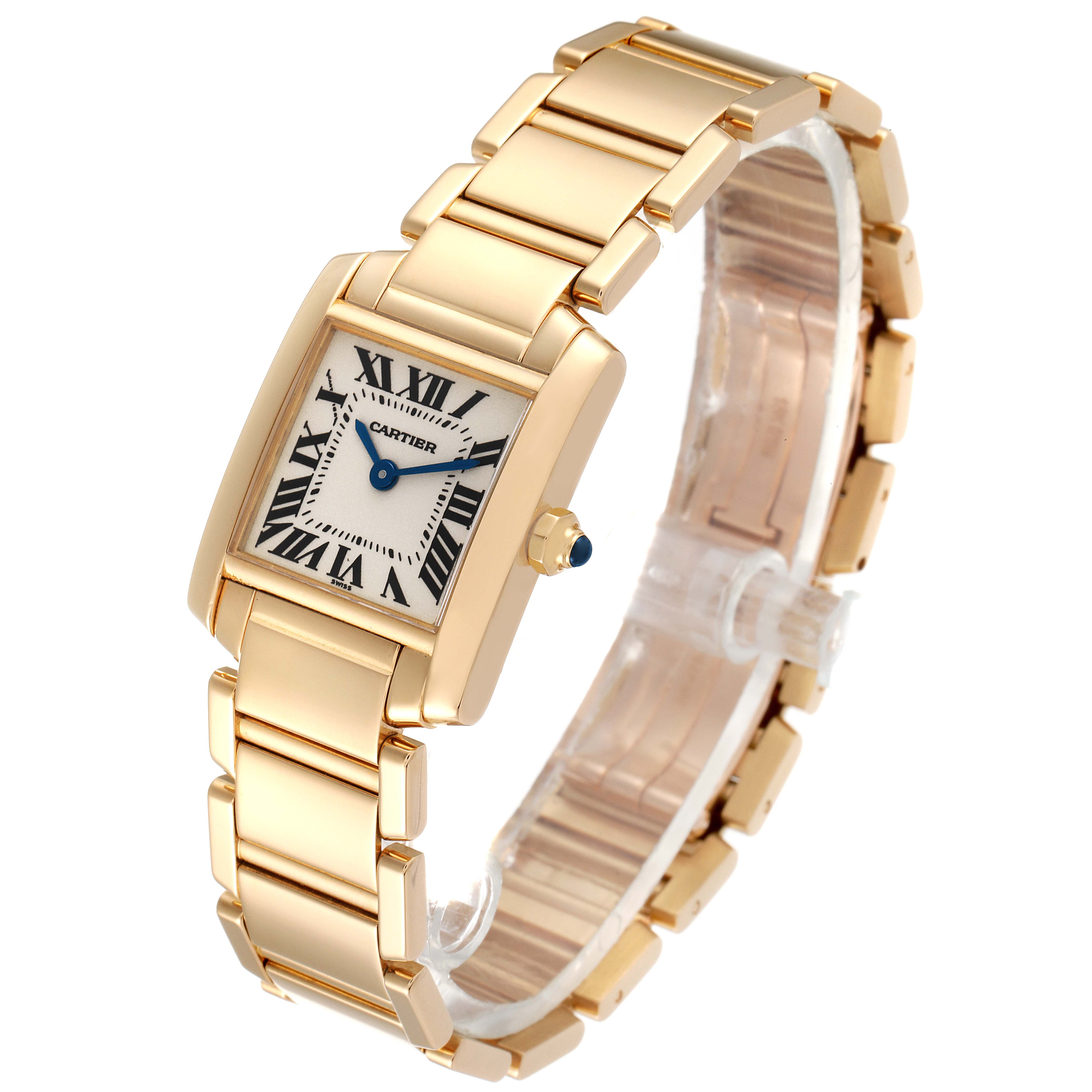 The Cartier Tank Française watch is shown at an oblique angle, highlighting its gold bracelet and rectangular face.