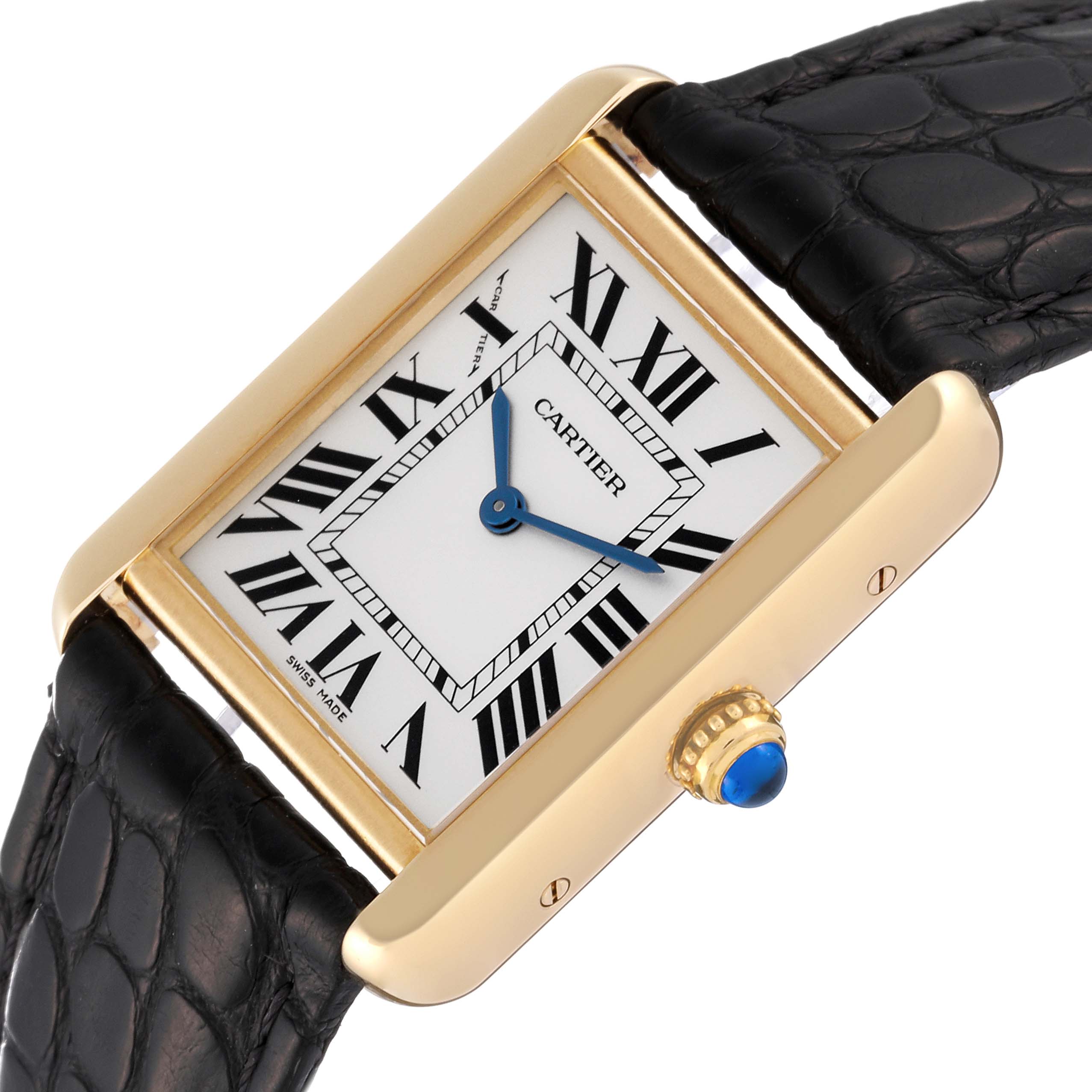 The image shows the front and side view of a Cartier Tank Solo W1018755 Women
s Steel and Gold (two tone) Silver Dial W1018755 Women
s Steel and Gold (two tone) Silver Dial watch, focusing on the dial, crown, and leather strap.