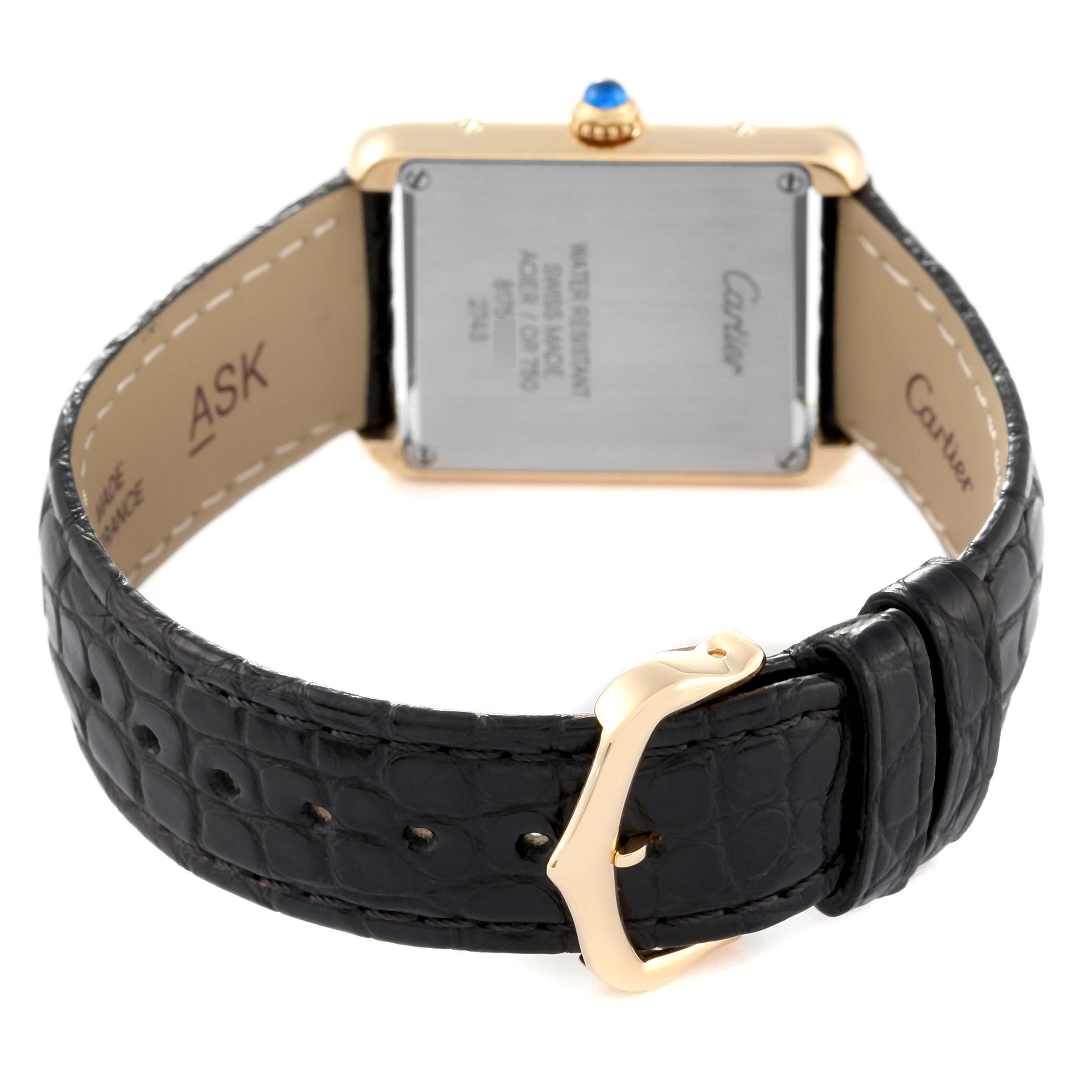 The image shows the Cartier Tank Solo W1018755 Women
s Steel and Gold (two tone) Silver Dial W1018755 Women
s Steel and Gold (two tone) Silver Dial watch from the back, highlighting the buckle, strap, and caseback. 