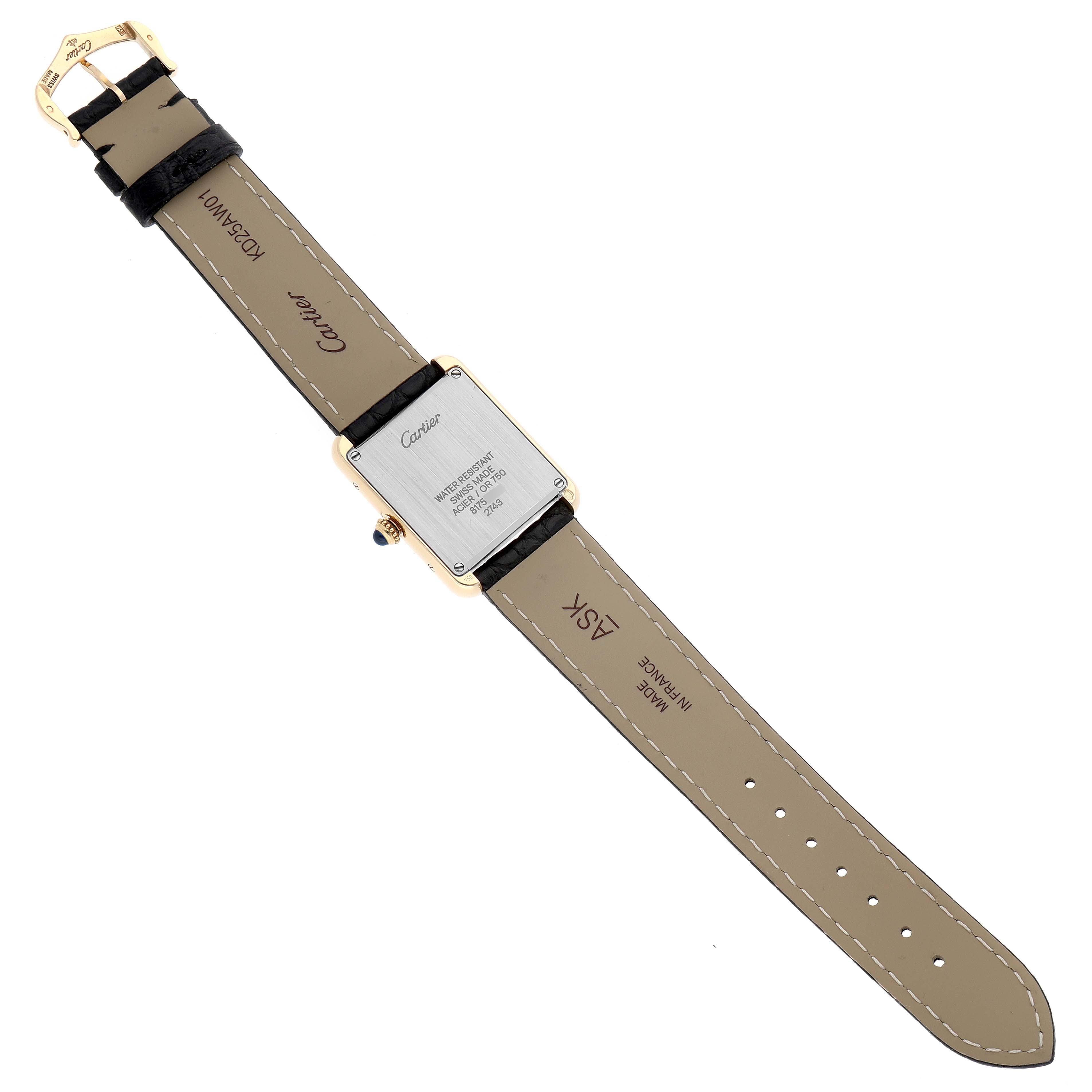 The image shows the back view of a Cartier Tank Solo W1018755 Women
s Steel and Gold (two tone) Silver Dial W1018755 Women
s Steel and Gold (two tone) Silver Dial watch, highlighting the strap and case back details.