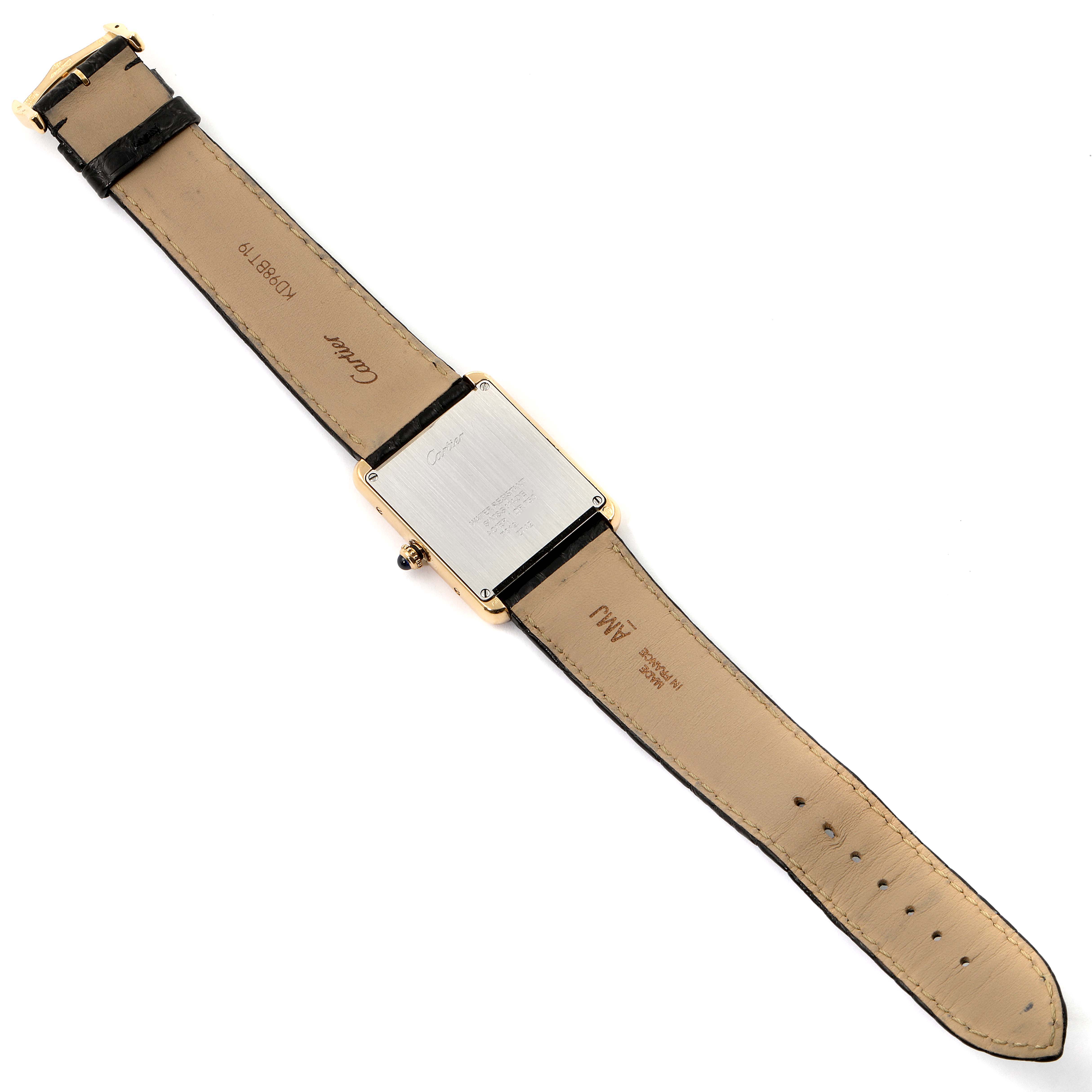 The image shows the Tank Solo by Cartier watch from a rear angle, displaying the case back and leather strap.