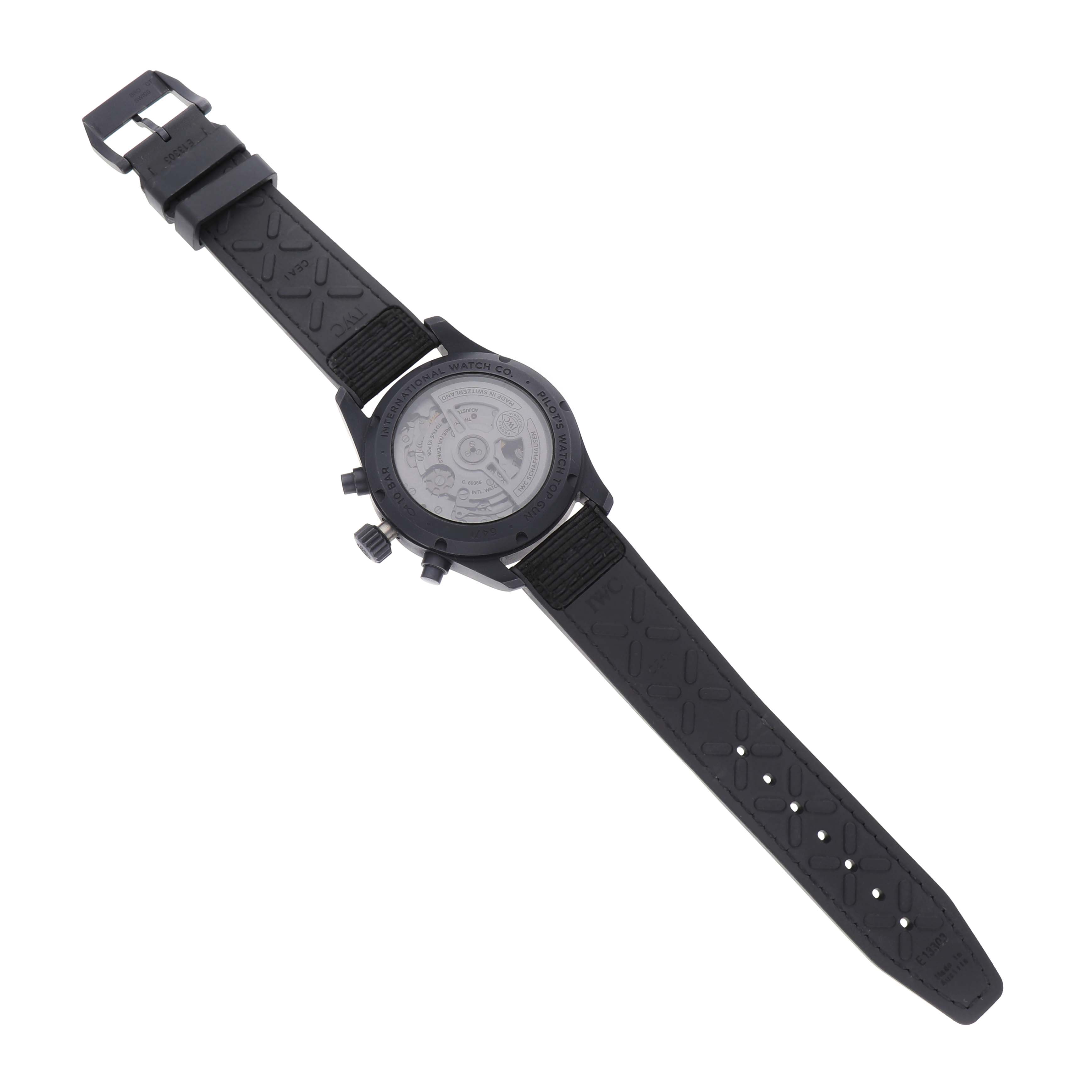 The image shows the back view of an IWC Pilot IW388106 Men's Ceramic Black Dial watch, highlighting the case back and the textured black strap.