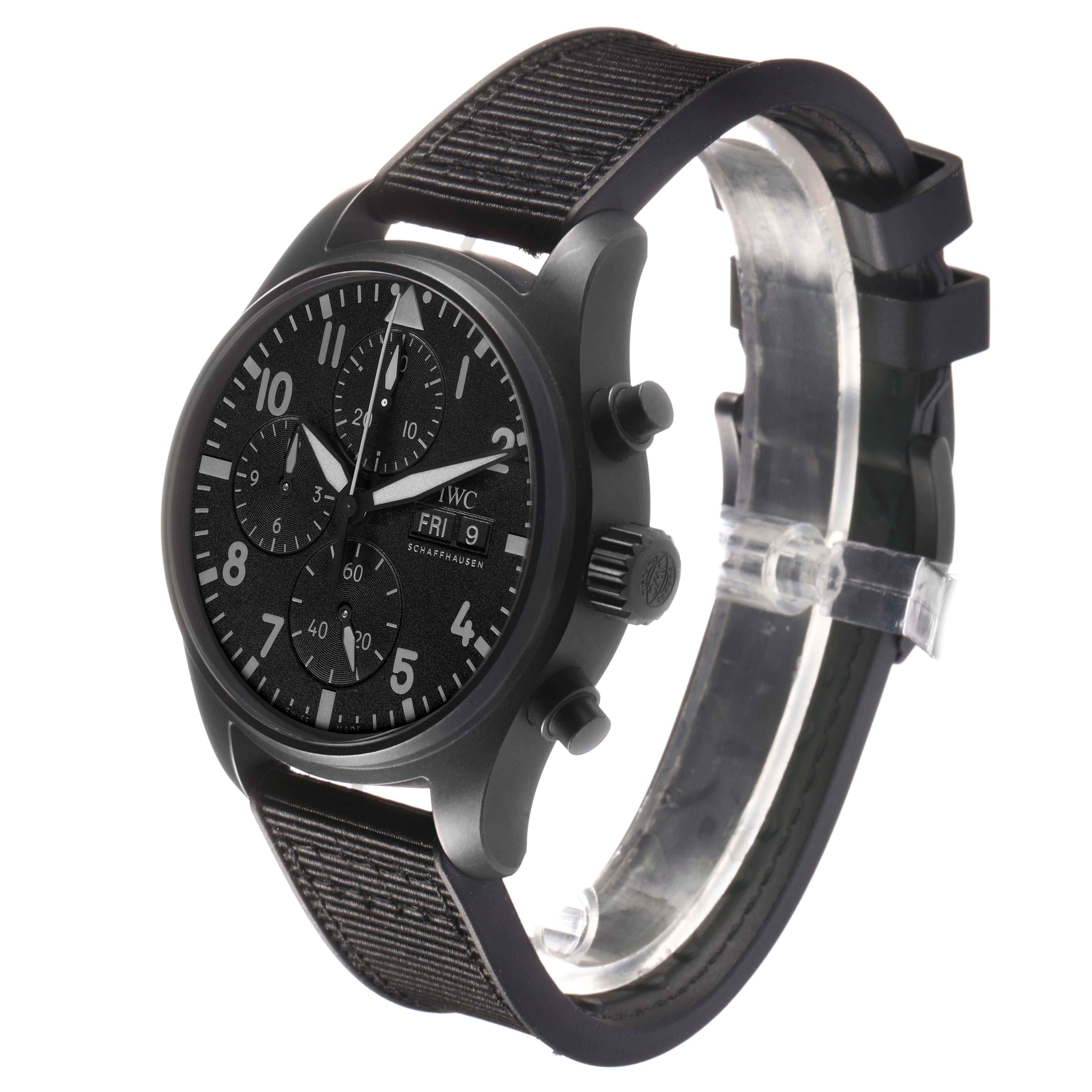 The IWC Pilot IW388106 Men's Ceramic Black Dial watch is shown at a side angle, highlighting the dial, crown, pushers, and textured strap.