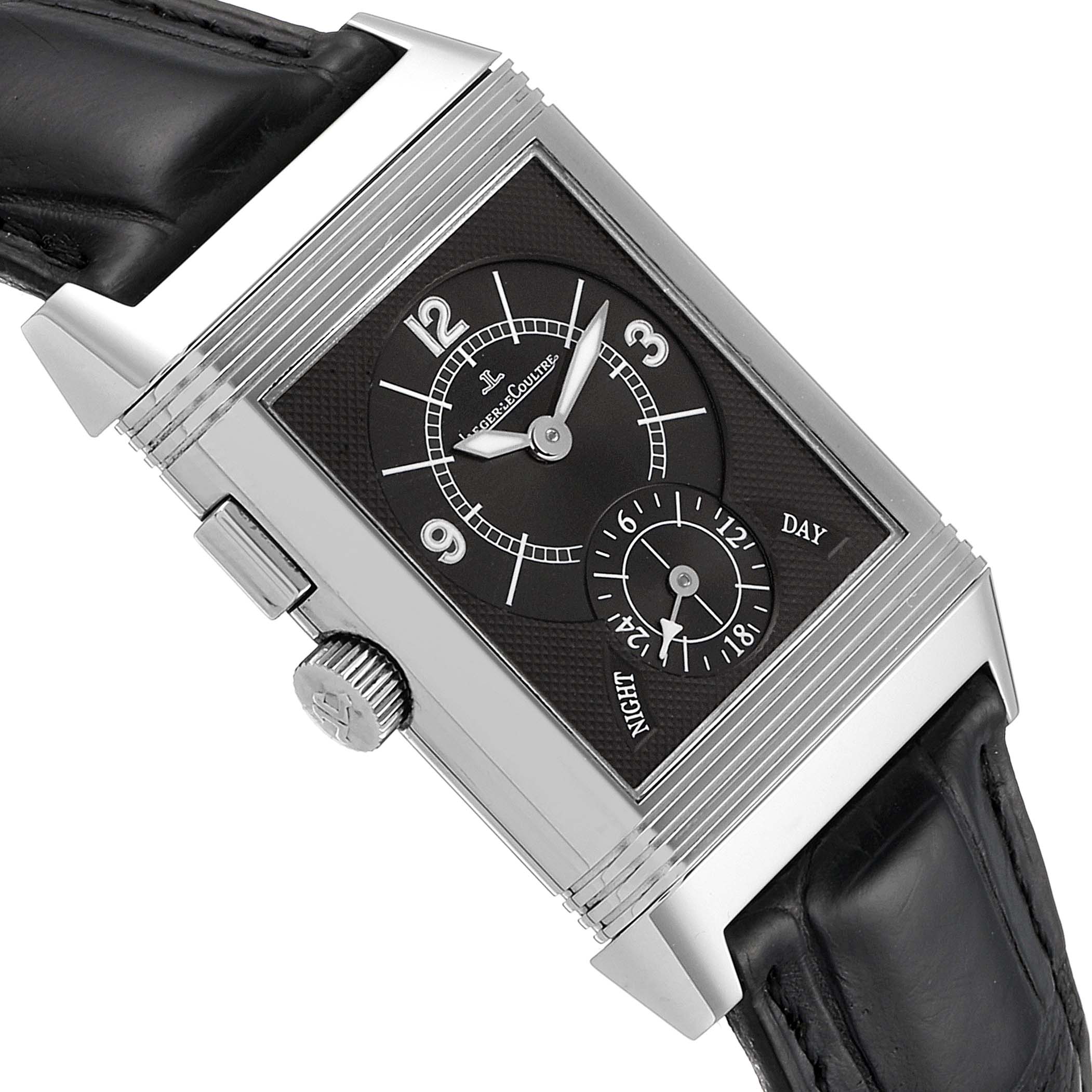 This image shows a close-up of a Jaeger LeCoultre Reverso Q2458420 Men's Stainless Steel Silver Dial Q2458420 Men's Stainless Steel Silver Dial watch, featuring its face, crown, and part of the leather strap.