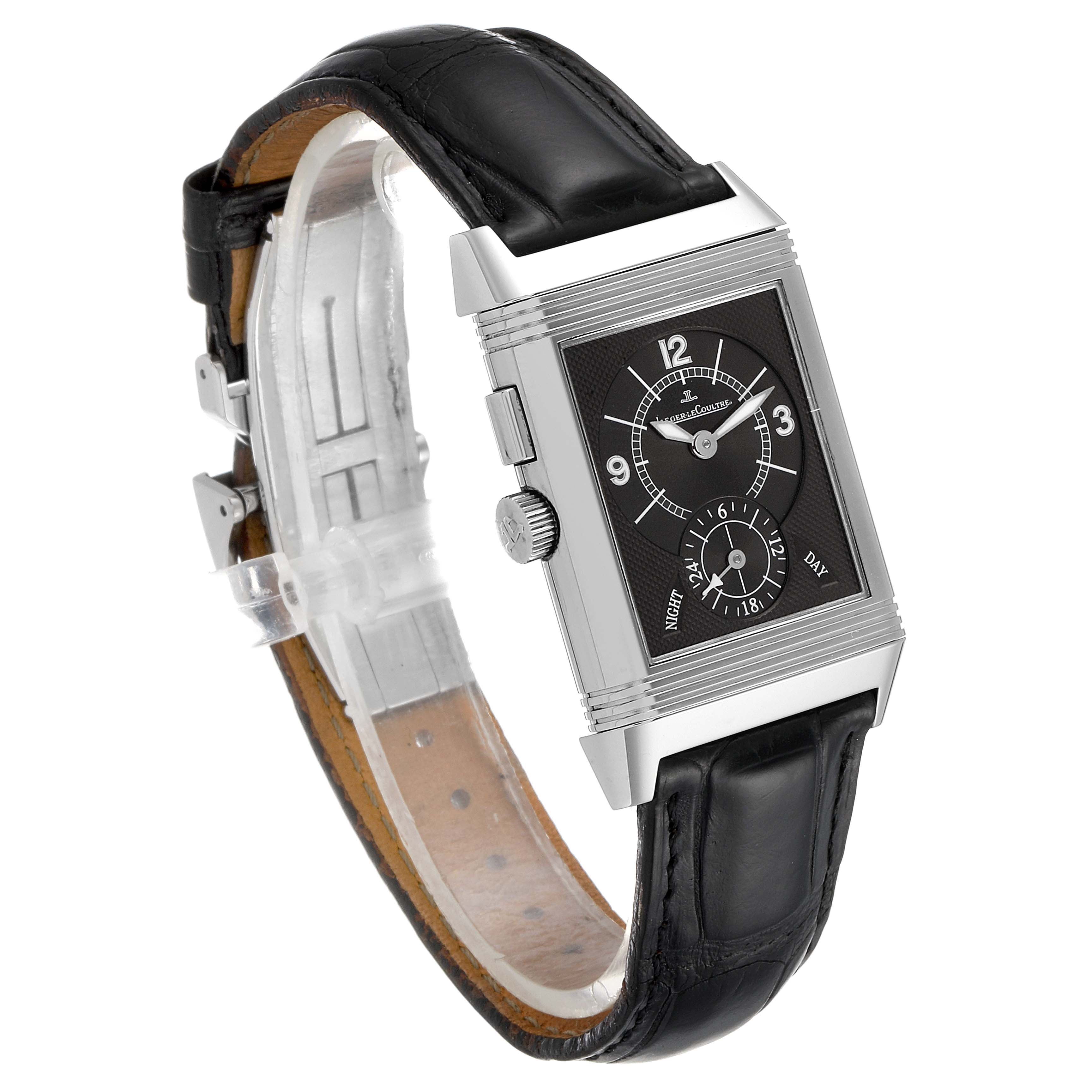 The image shows a side-angle view of the Jaeger-LeCoultre Reverso model, displaying the dial, crown, and leather strap.
