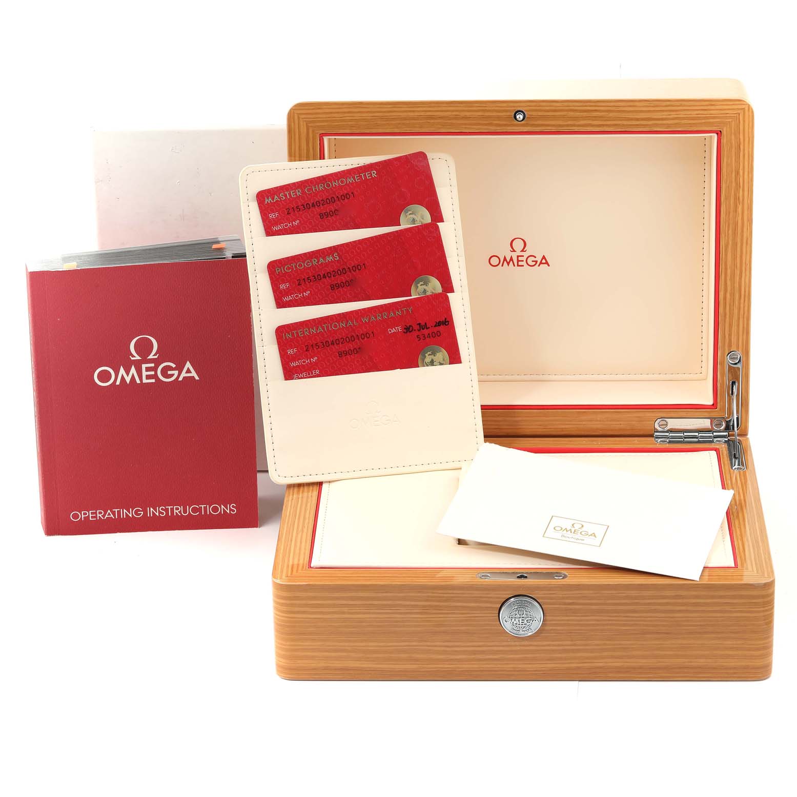 This image shows the packaging for an Omega Planet Ocean 215.30.40.20.01.001 Men's Stainless Steel Black Dial 215.30.40.20.01.001 Men's Stainless Steel Black Dial watch, including the wooden box, operating instructions, warranty cards, and documentation.