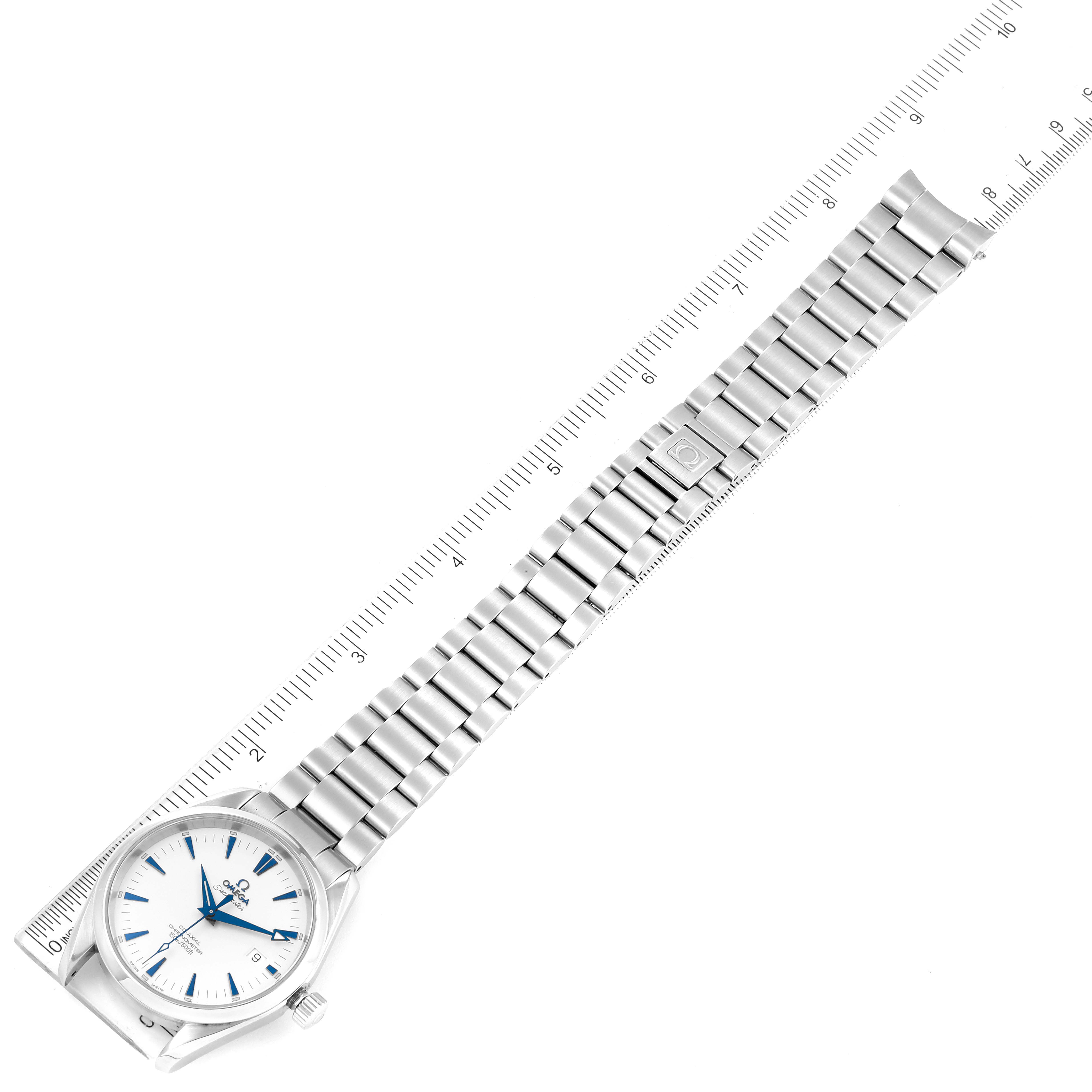 The image shows an Omega Aqua Terra 2503.33.00 Men
s Stainless Steel Silver Dial 2503.33.00 Men
s Stainless Steel Silver Dial watch placed horizontally with its band extended and aligned next to a ruler.