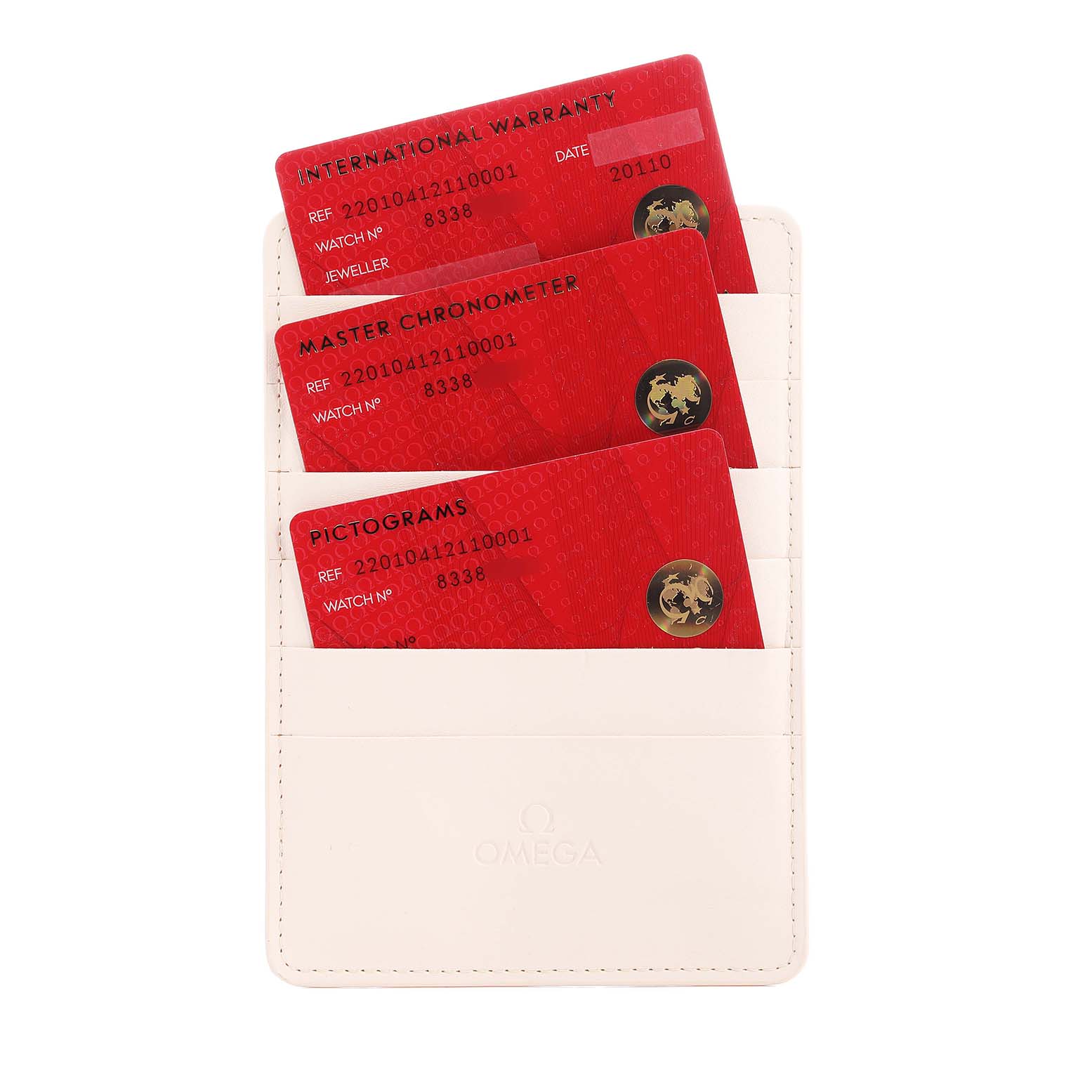 The image shows three red cards (warranty, chronometer, pictograms) in a white Omega cardholder for the Omega Aqua Terra 220.10.41.21.10.001 Men's Stainless Steel Green Dial model.