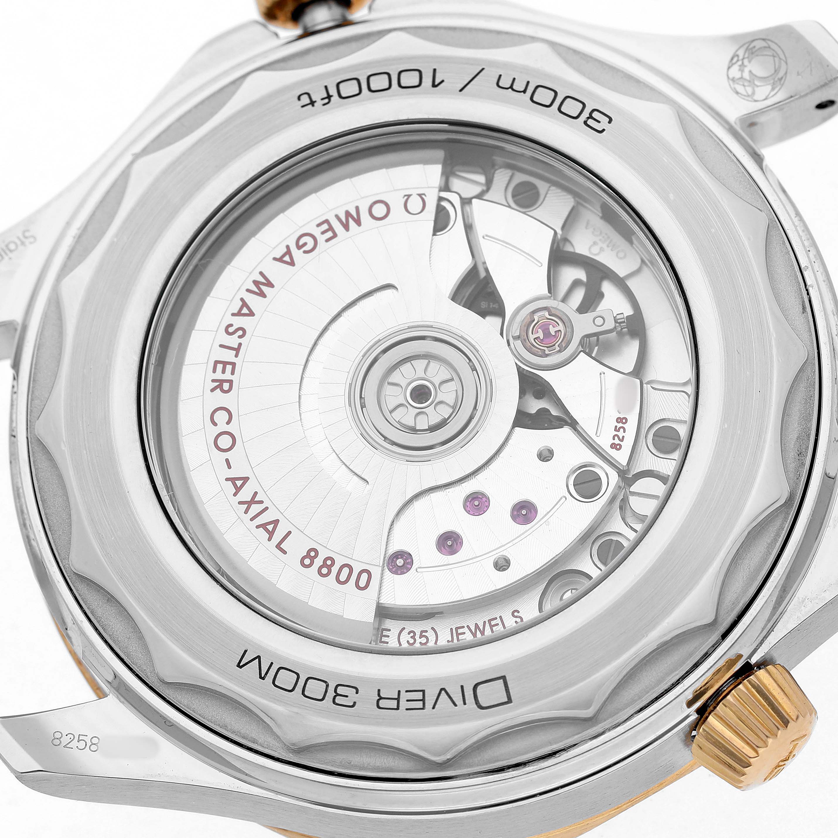 The image shows the case back of an Omega Seamaster 210.20.42.20.03.001 Men's Steel and Gold (two tone) Blue Dial, highlighting the movement and rotor.