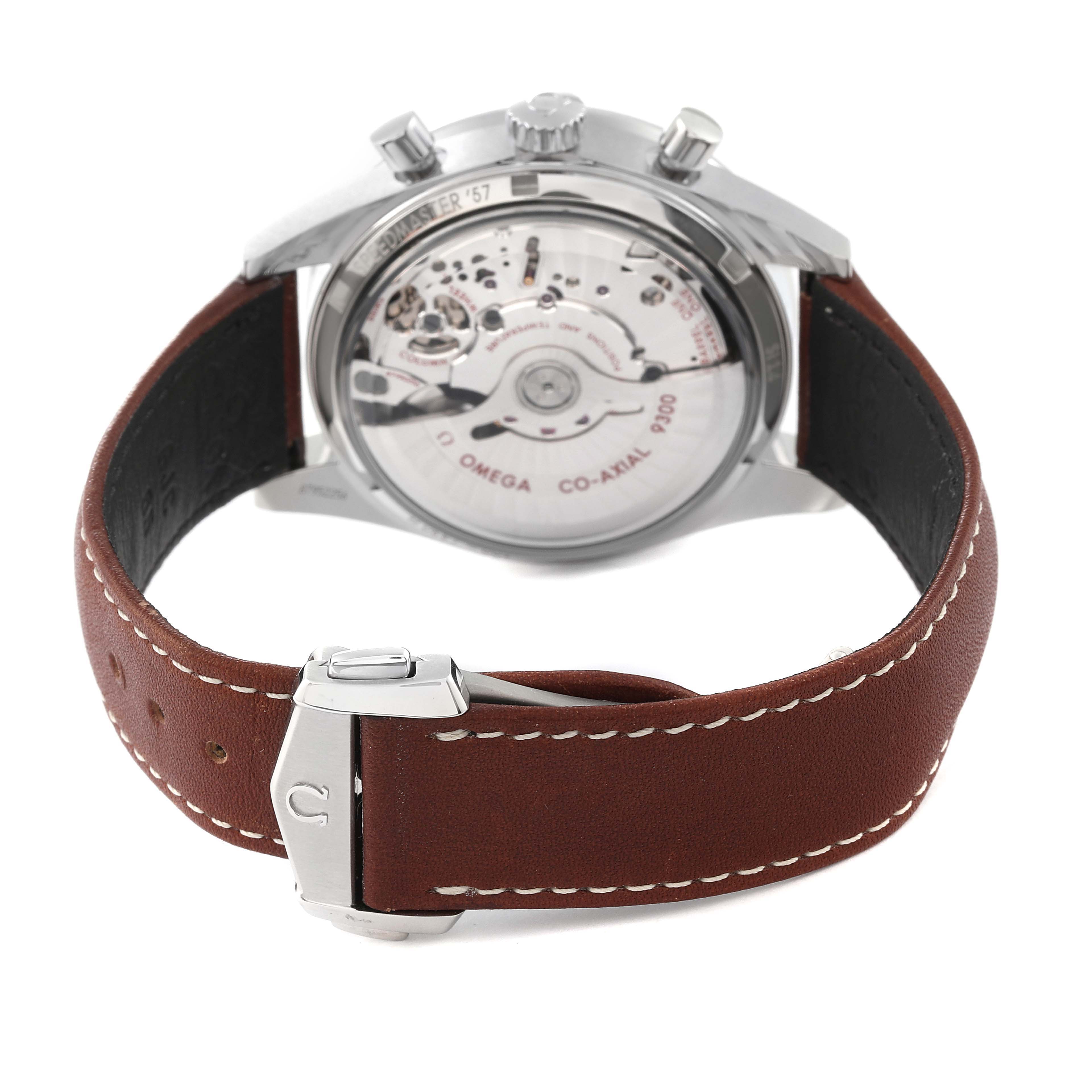 The image shows the back view of an Omega Speedmaster 331.12.42.51.01.001 Men's Stainless Steel Black Dial 331.12.42.51.01.001 Men's Stainless Steel Black Dial watch, displaying its movement and brown leather strap.