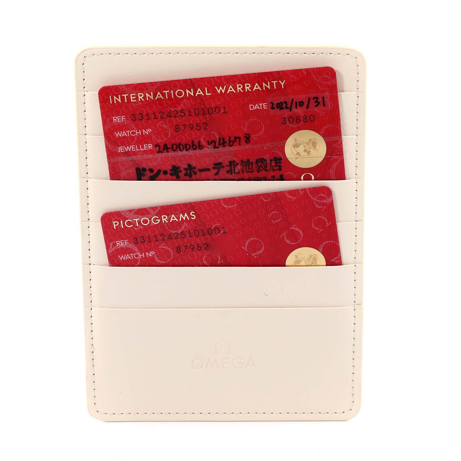 The image shows two Omega Speedmaster 331.12.42.51.01.001 Men's Stainless Steel Black Dial 331.12.42.51.01.001 Men's Stainless Steel Black Dial model cards in a white holder, taken from a top-down angle.