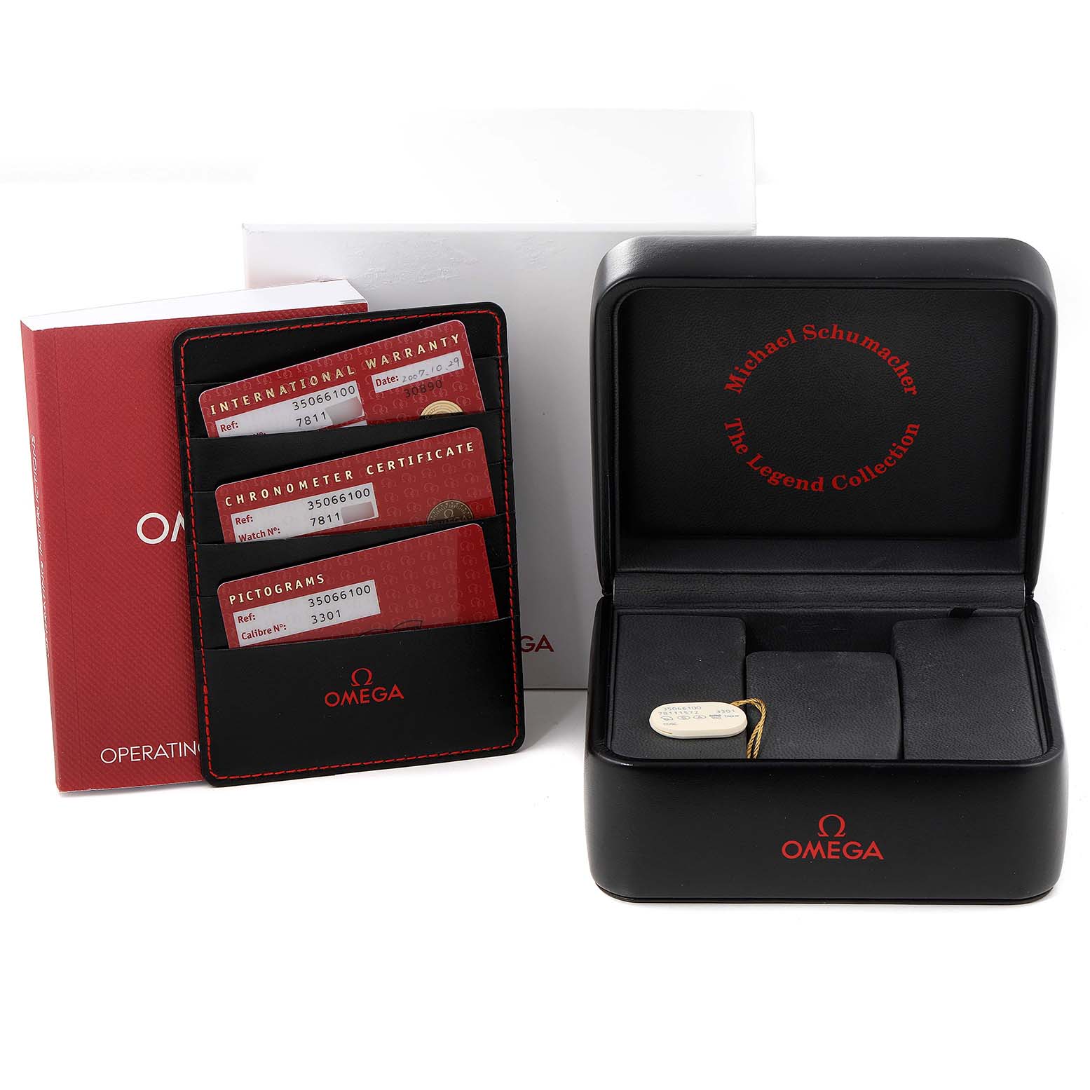 The image shows the packaging, warranty card holder, certificates, and watch box for an Omega Speedmaster 3506.61.00 Men
s Stainless Steel Red Dial 3506.61.00 Men
s Stainless Steel Red Dial.