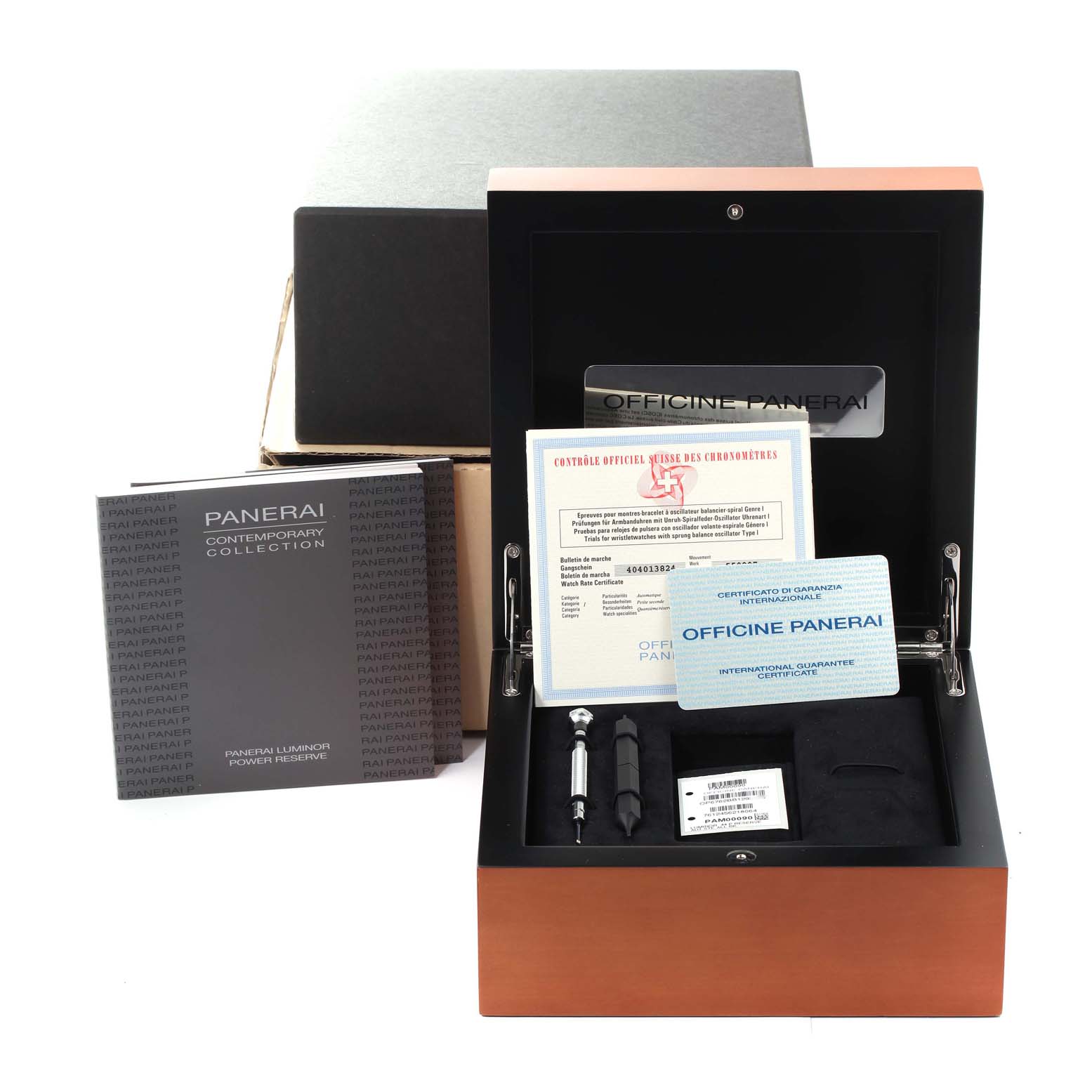 The image shows a Panerai Luminor PAM00090 Men's Stainless Steel Black Dial PAM00090 Men's Stainless Steel Black Dial watch box set including tools, documentation, and packaging from a front angle.