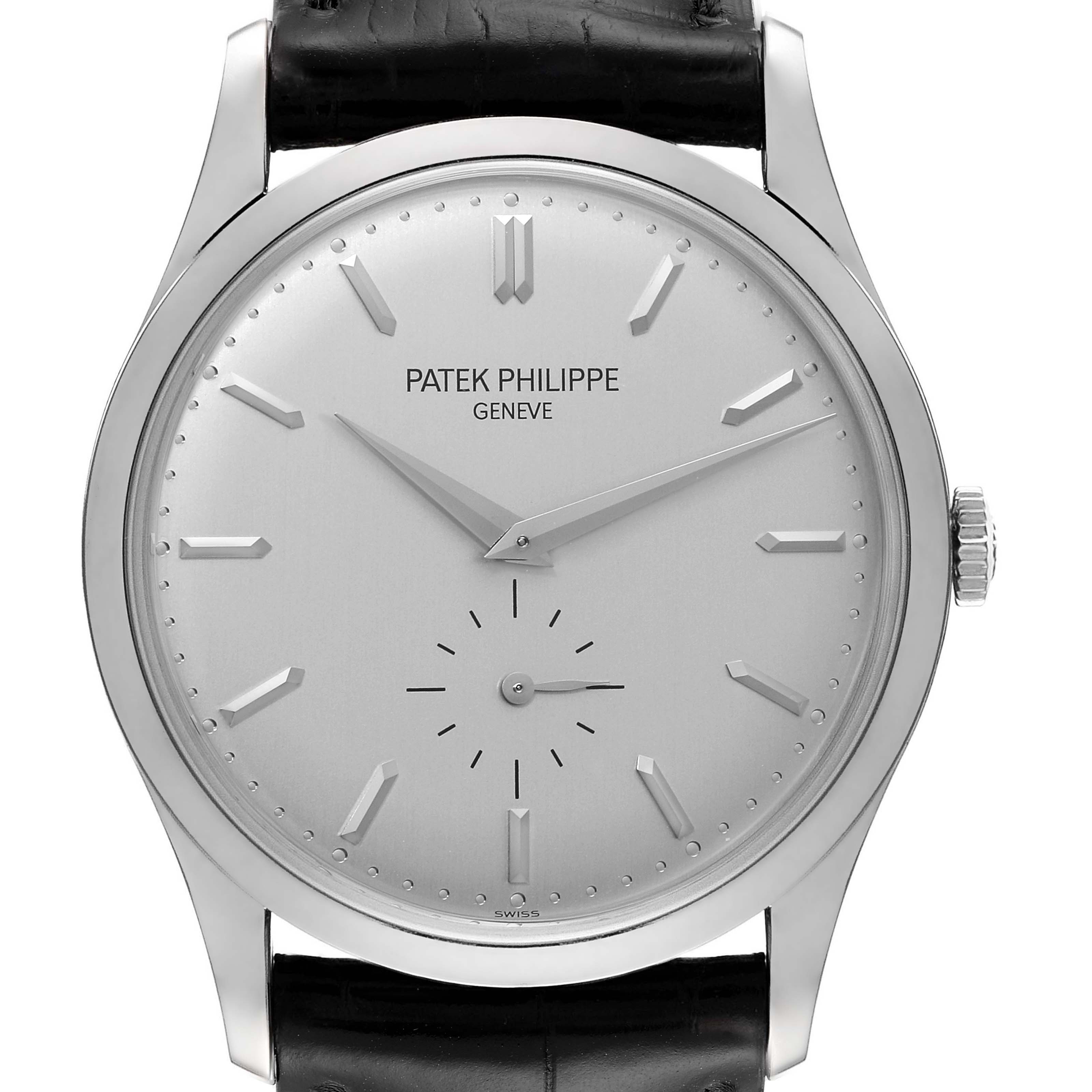 The image shows a front view of a Patek Philippe Calatrava 5196G Men's White Gold Silver Dial 5196G Men's White Gold Silver Dial watch, highlighting its dial, hour markers, and leather strap.