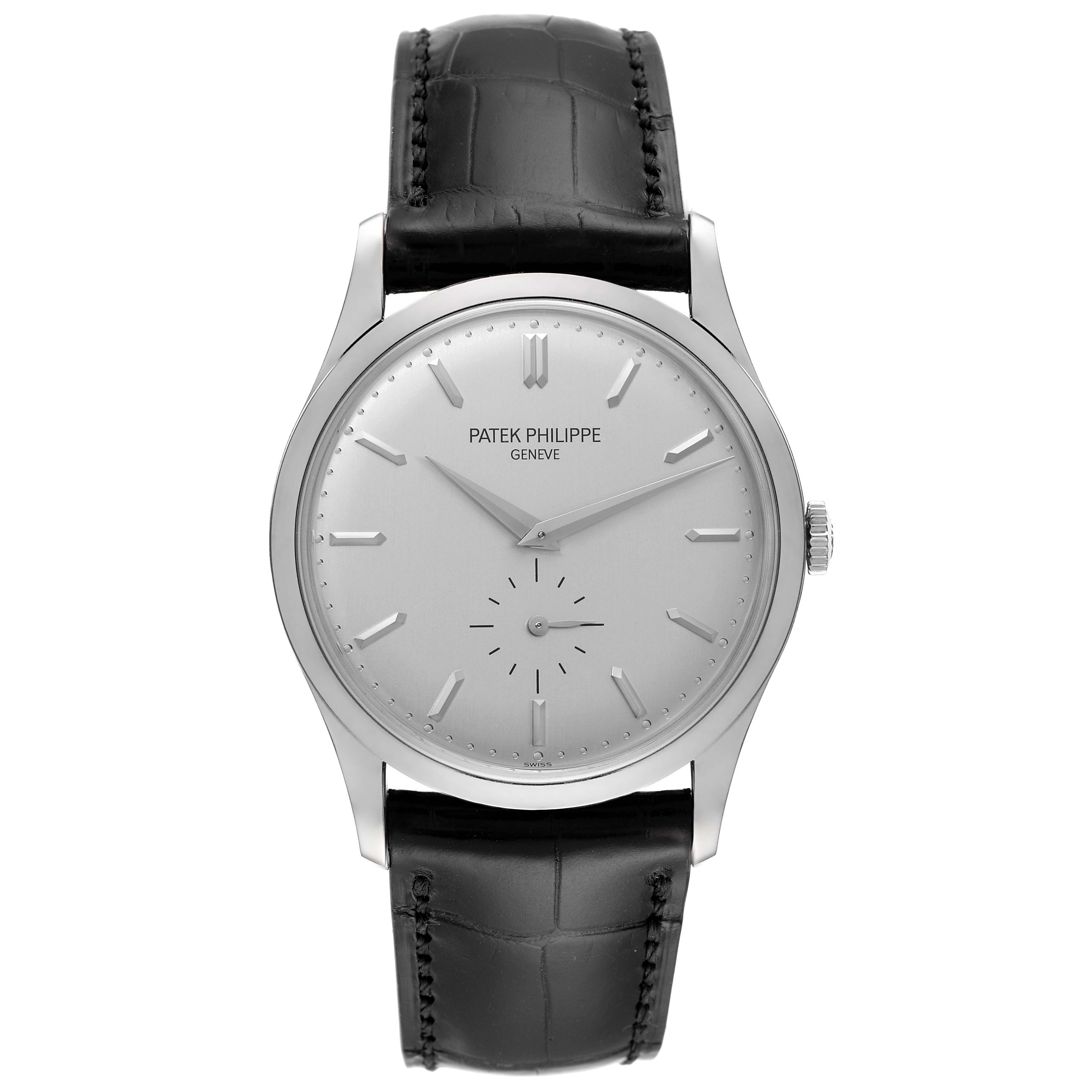 This image shows a front view of a Patek Philippe Calatrava 5196G Men's White Gold Silver Dial 5196G Men's White Gold Silver Dial watch with a black leather strap and a silver dial.