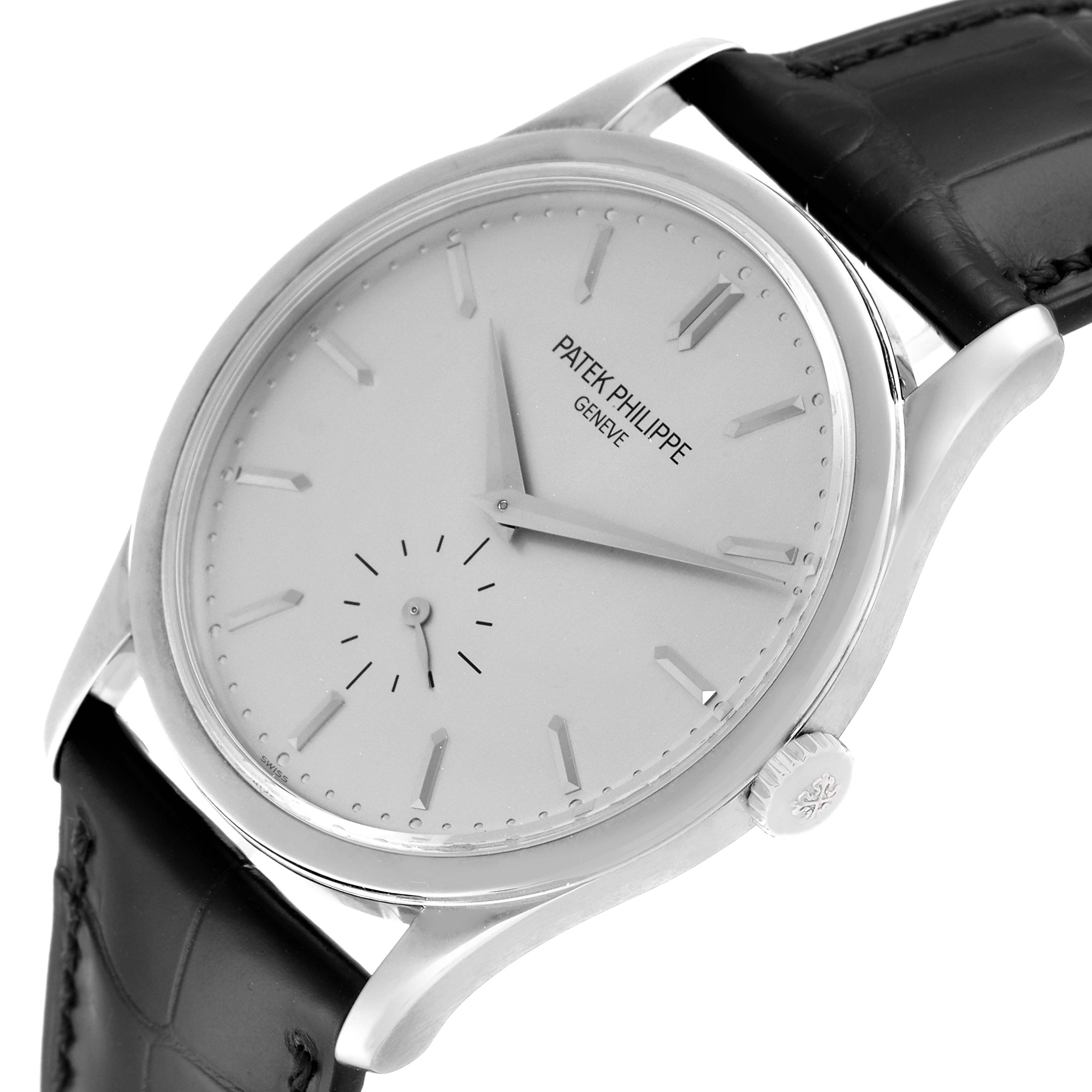 The Patek Philippe Calatrava 5196G Men's White Gold Silver Dial 5196G Men's White Gold Silver Dial watch is shown at a slight angle, highlighting the dial, hands, case, and part of the leather strap.