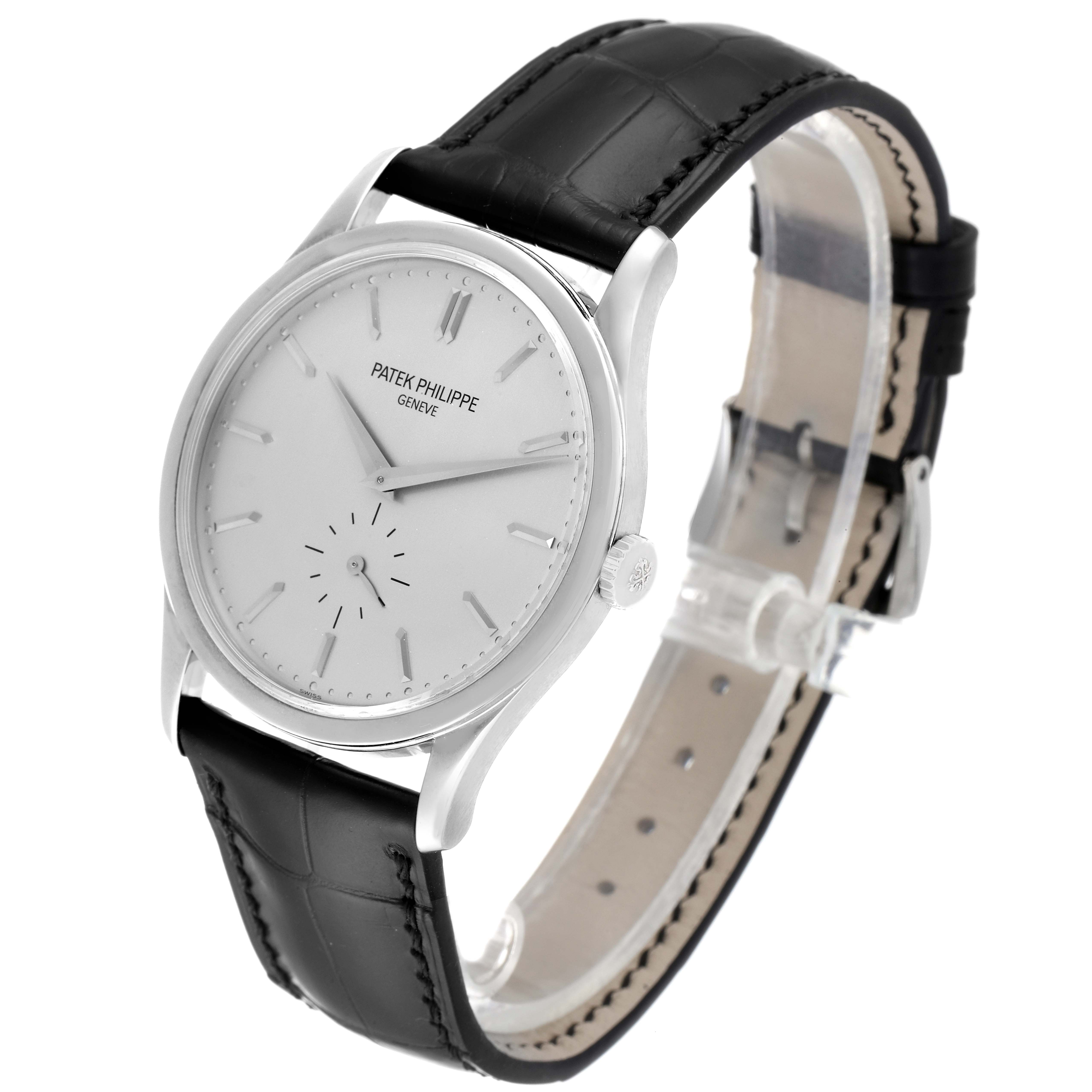 This image shows a Patek Philippe Calatrava 5196G Men's White Gold Silver Dial 5196G Men's White Gold Silver Dial watch from a front angle, highlighting the dial, case, and leather strap.