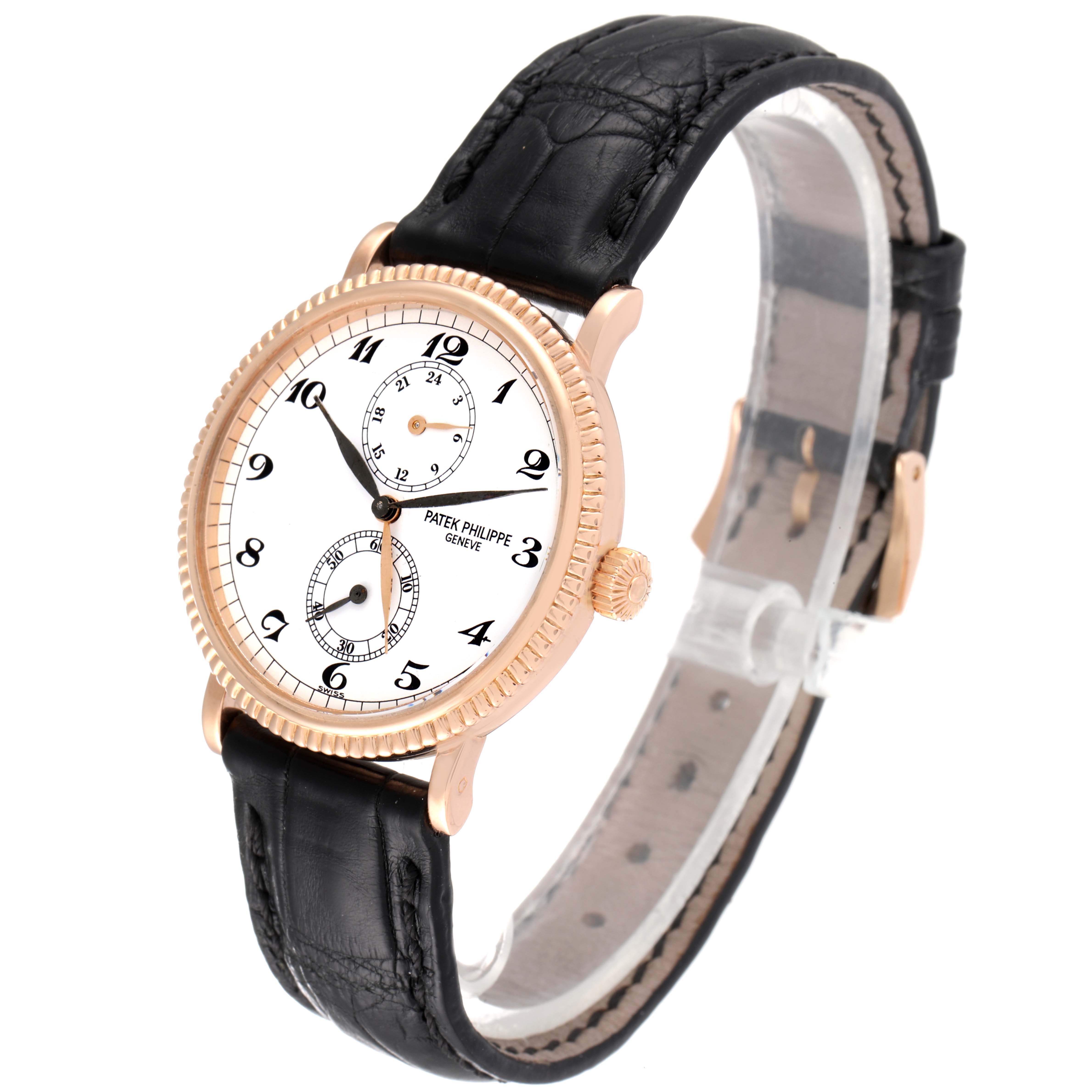 The image shows a Patek Philippe Calatrava 5034R Men
s Rose Gold White Dial 5034R Men
s Rose Gold White Dial watch at a three-quarter angle highlighting the dial, case, and strap.