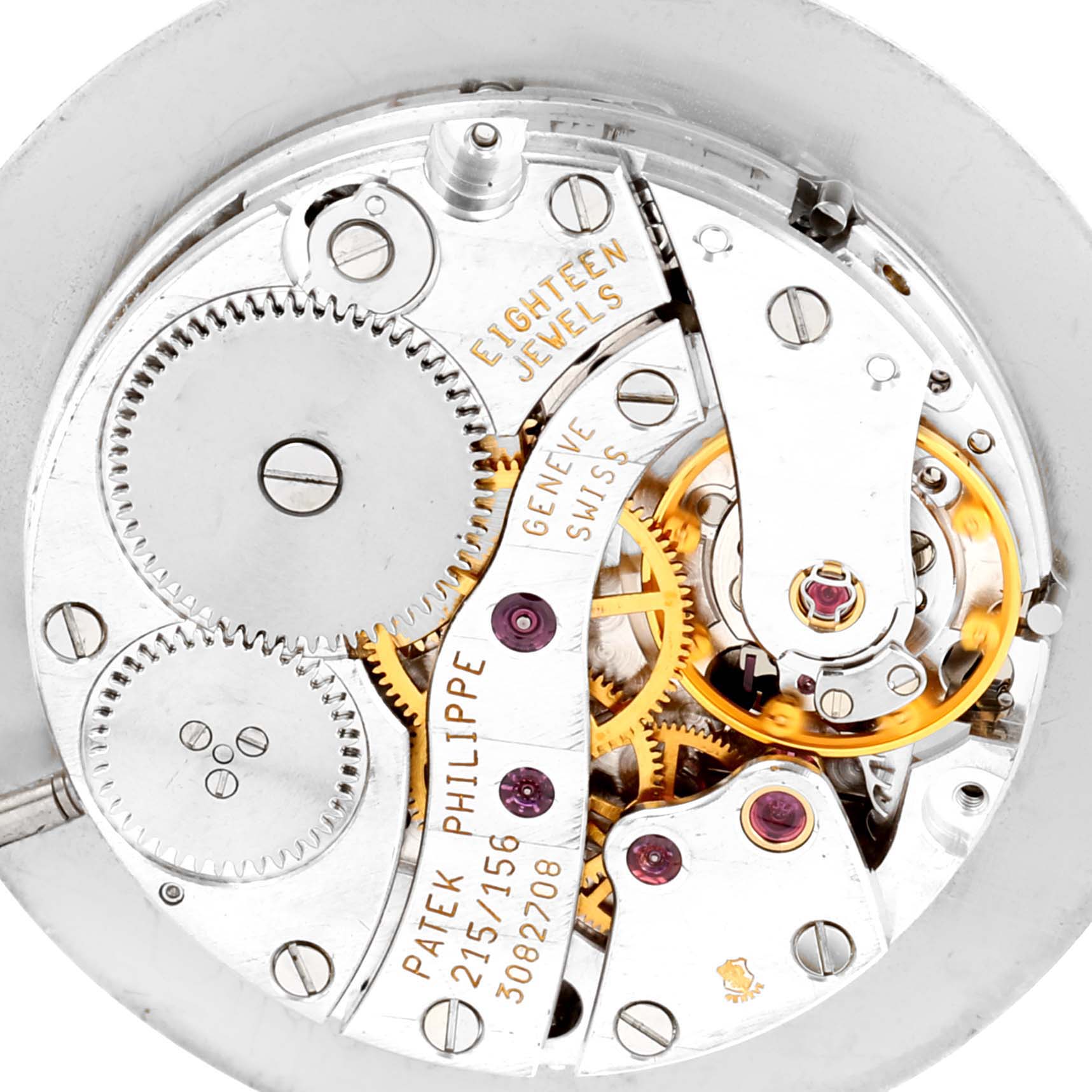 The image shows the inner movement mechanism of the Patek Philippe Calatrava 5034R Men
s Rose Gold White Dial 5034R Men
s Rose Gold White Dial watch from a top-down angle.
