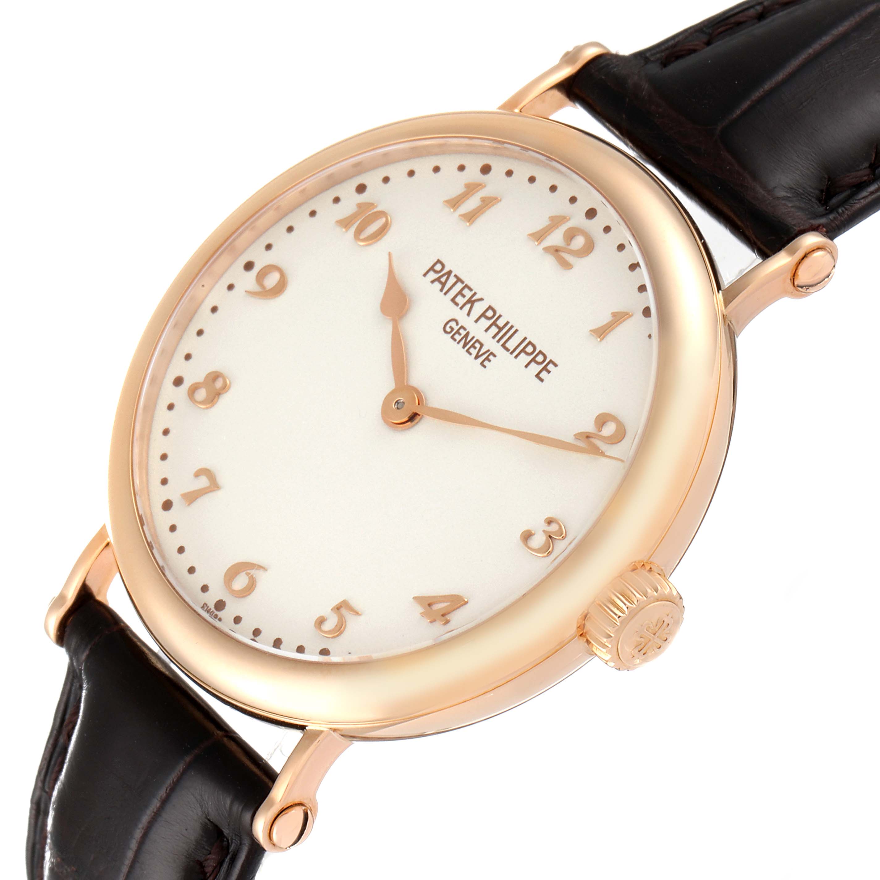 The image shows a Patek Philippe Calatrava 7200R Men
s Rose Gold Silver Dial 7200R Men
s Rose Gold Silver Dial watch from an angled side view, featuring the dial, casing, and strap.