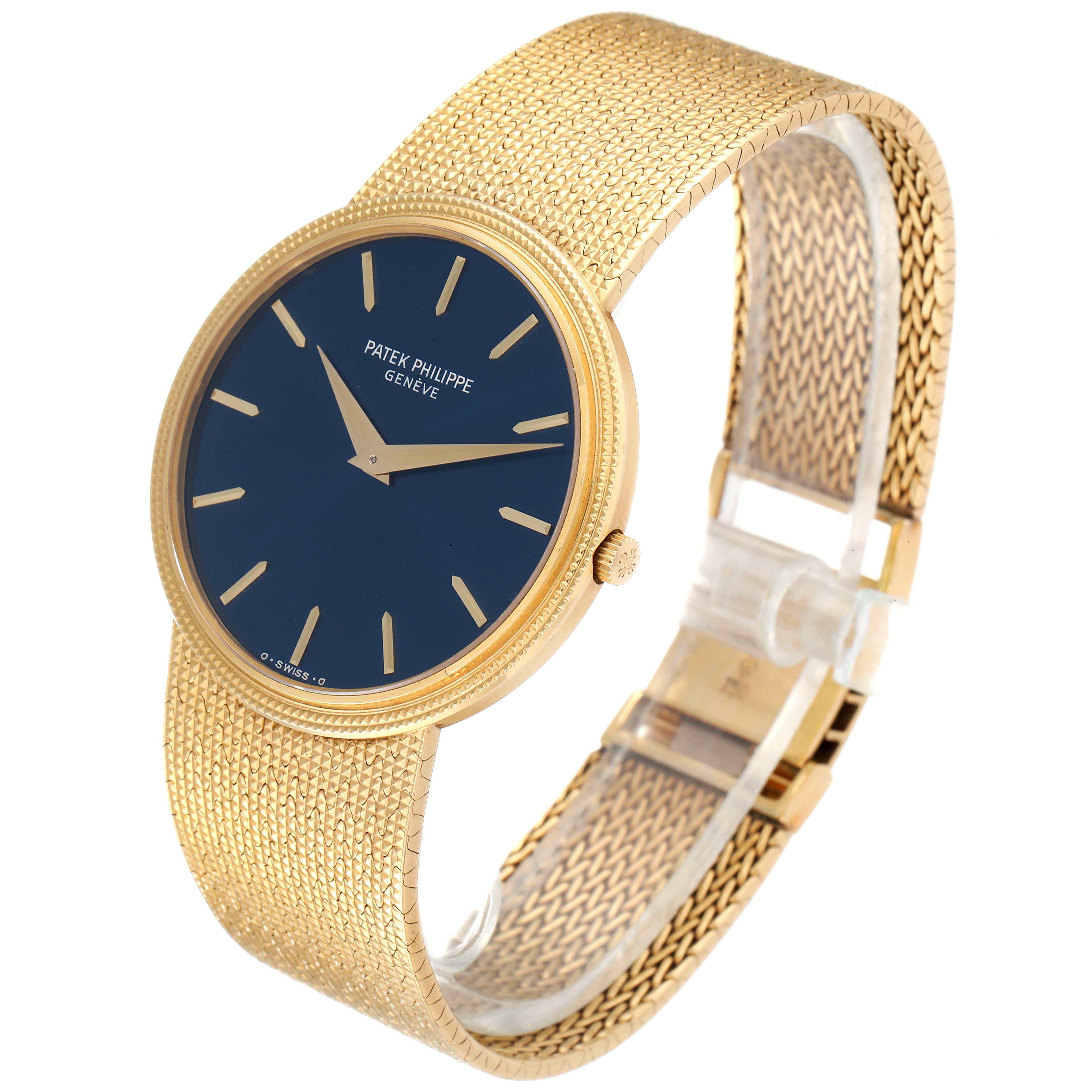 This image shows a side angle of the Vintage Patek Philippe watch, highlighting its gold mesh band, blue dial, and gold hour markers.