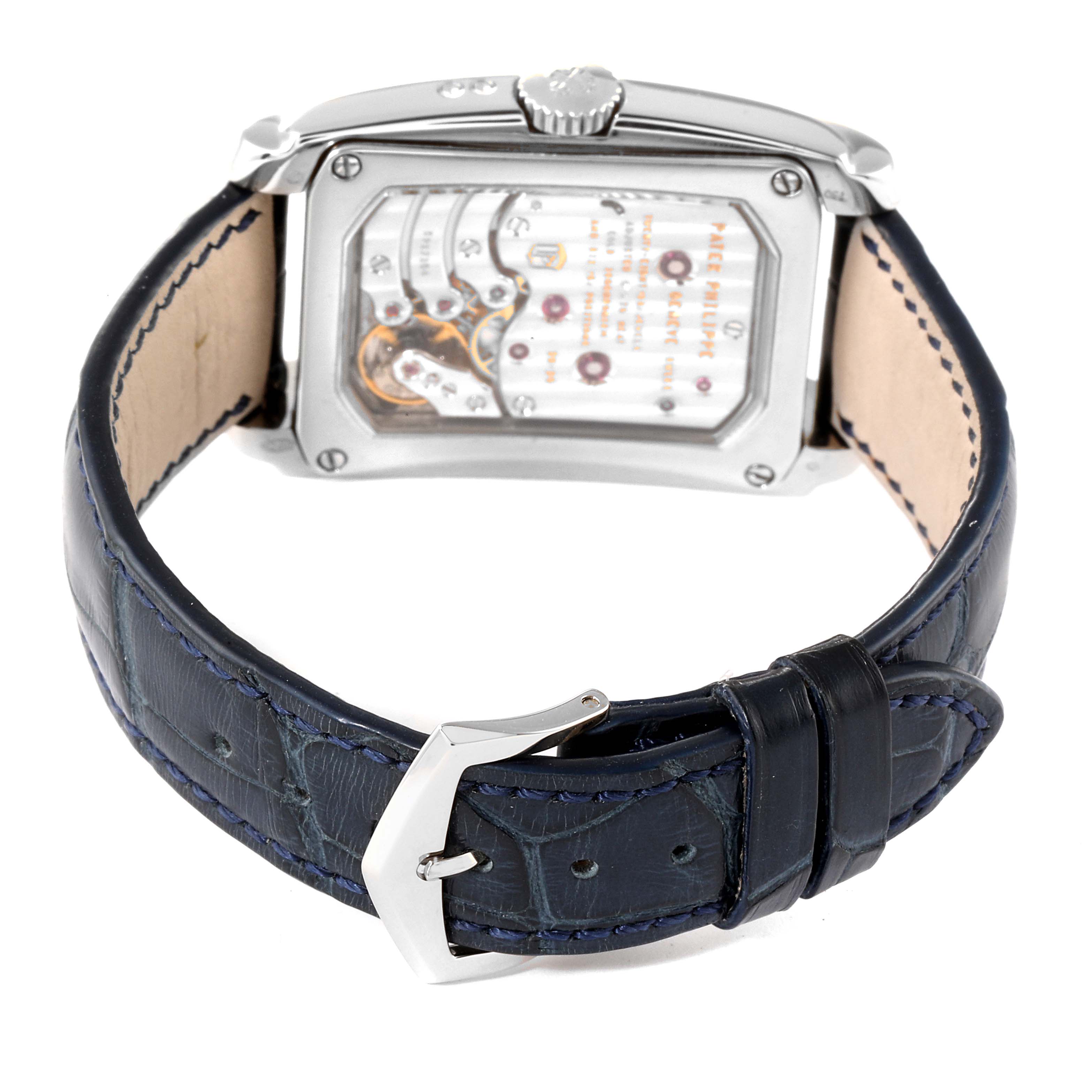 The image shows the back view of a Patek Philippe Gondolo 5200G-010 Men's White Gold Blue Dial 5200G-010 Men's White Gold Blue Dial watch, highlighting its movement and leather strap.