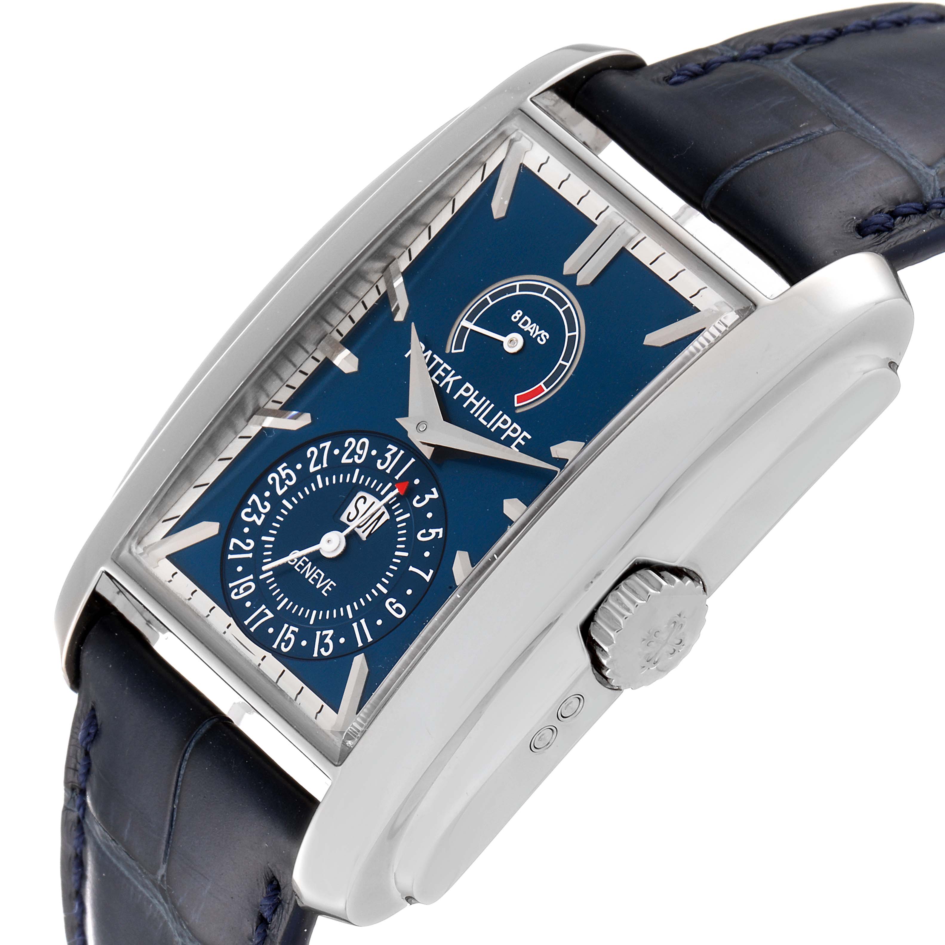 The image shows a side angle of the Patek Philippe Gondolo 5200G-010 Men's White Gold Blue Dial 5200G-010 Men's White Gold Blue Dial watch, highlighting the dial, crown, and blue leather strap.