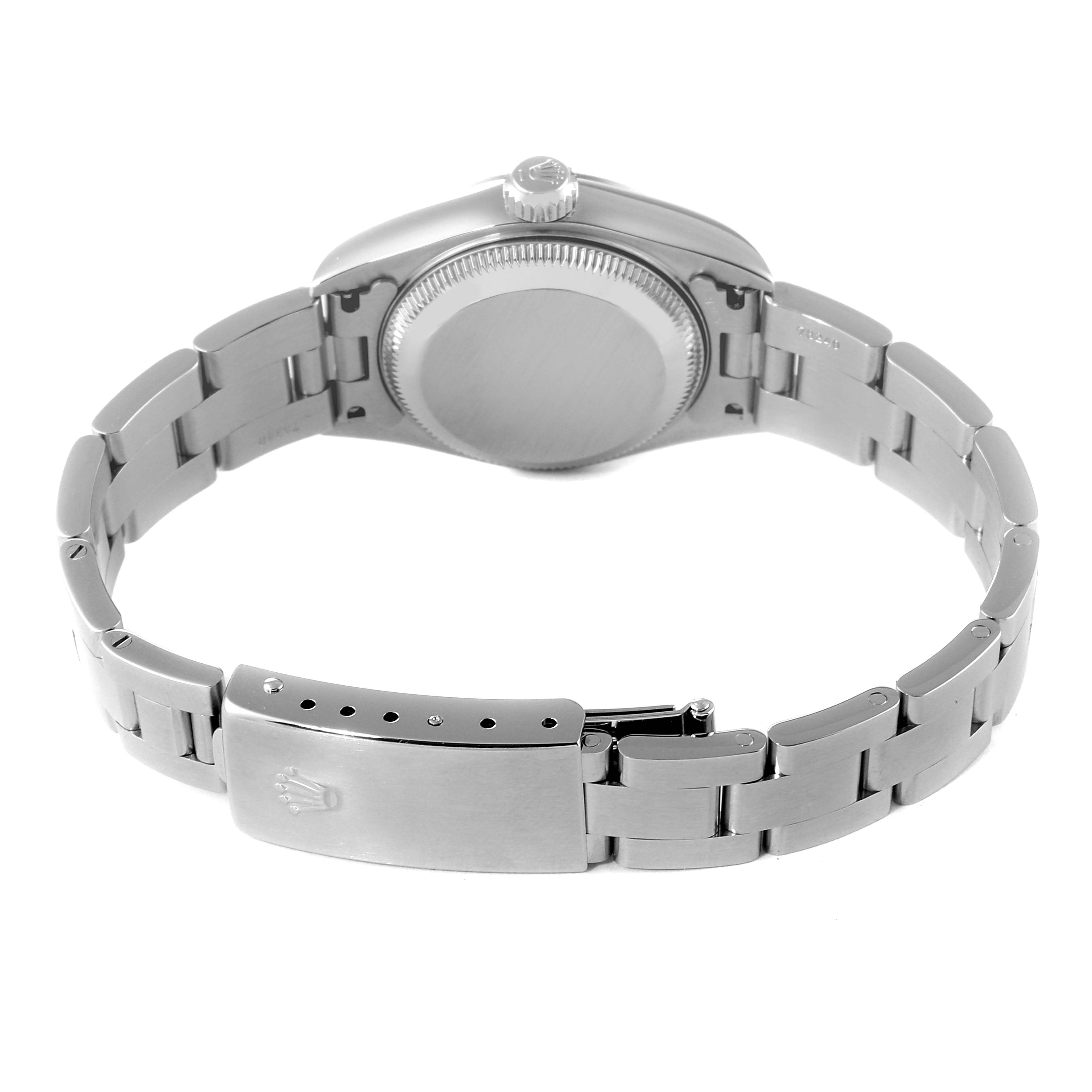 This image shows the Rolex Date 79160 Women
s Stainless Steel Black Dial 79160 Women
s Stainless Steel Black Dial watch from the rear, highlighting its case back, crown, and metal bracelet with the clasp open.