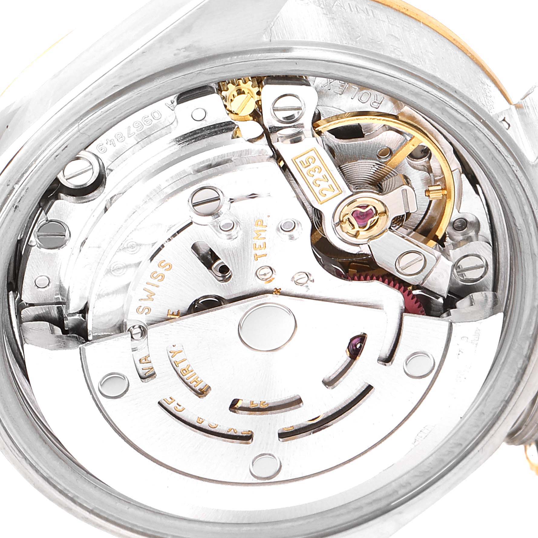 The image shows a close-up angle of the Rolex Datejust 79173 Women's Steel and Gold (two tone) White Dial 79173 Women's Steel and Gold (two tone) White Dial watch's movement, highlighting intricate mechanical components.