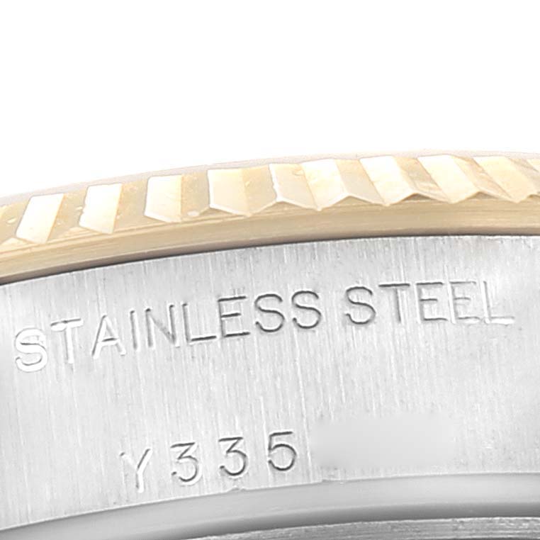 This image shows a close-up of the stainless steel bezel engraving on a Rolex Datejust 79173 Women's Steel and Gold (two tone) White Dial 79173 Women's Steel and Gold (two tone) White Dial watch.