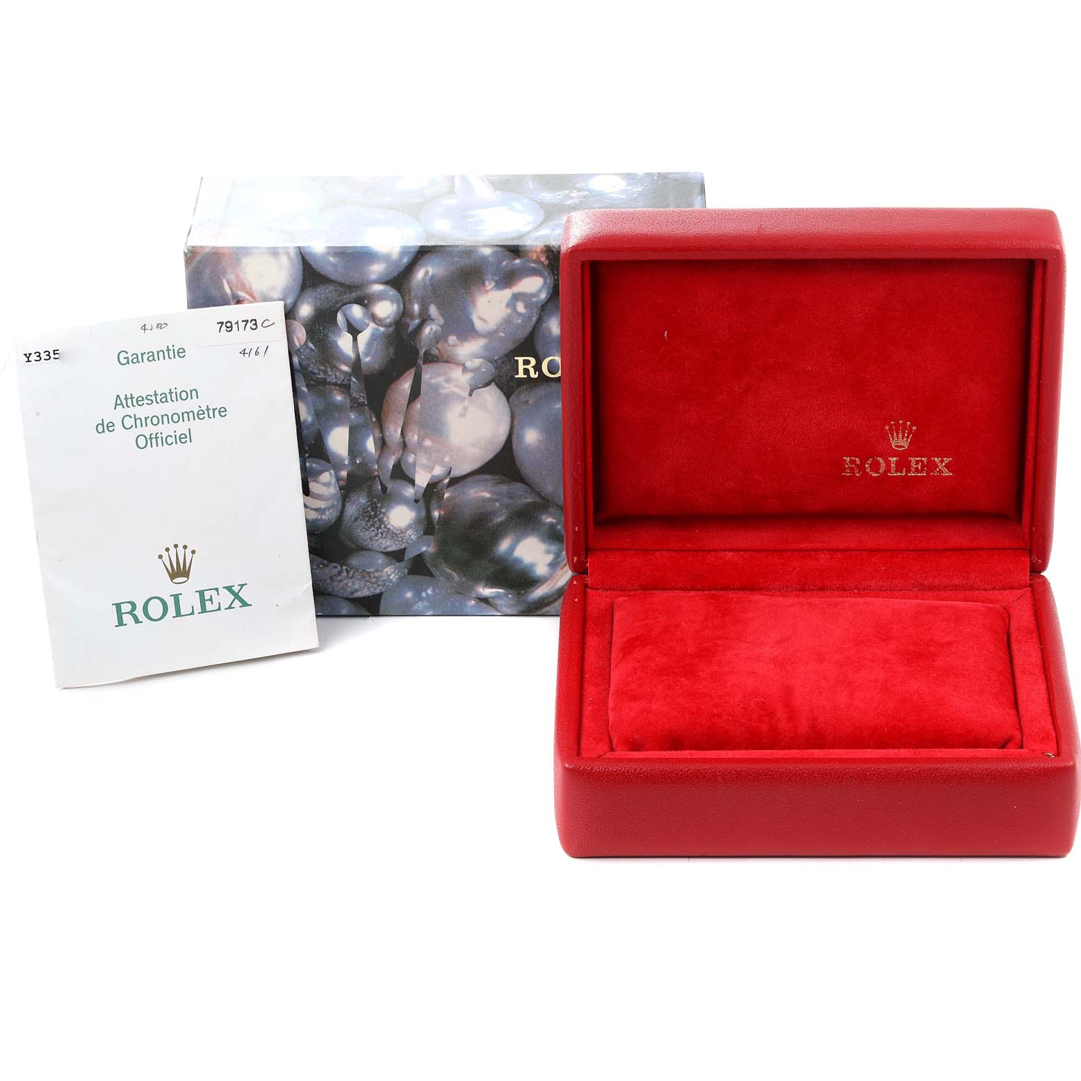 The image shows a red Rolex watch box, a warranty booklet, and an outer box, but the Rolex Datejust 79173 Women's Steel and Gold (two tone) White Dial 79173 Women's Steel and Gold (two tone) White Dial watch itself is not shown.