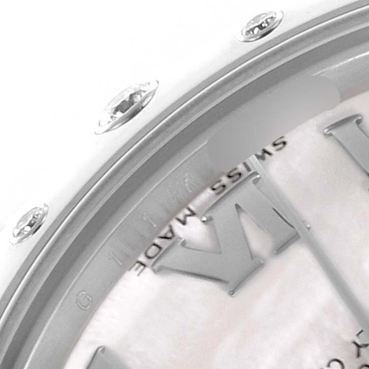 The image shows a close-up of the bezel and dial of a Rolex Mid-Size 178344 Women's Stainless Steel Mother of Pearl Dial 178344 Women's Stainless Steel Mother of Pearl Dial watch, highlighting its Roman numeral markers.