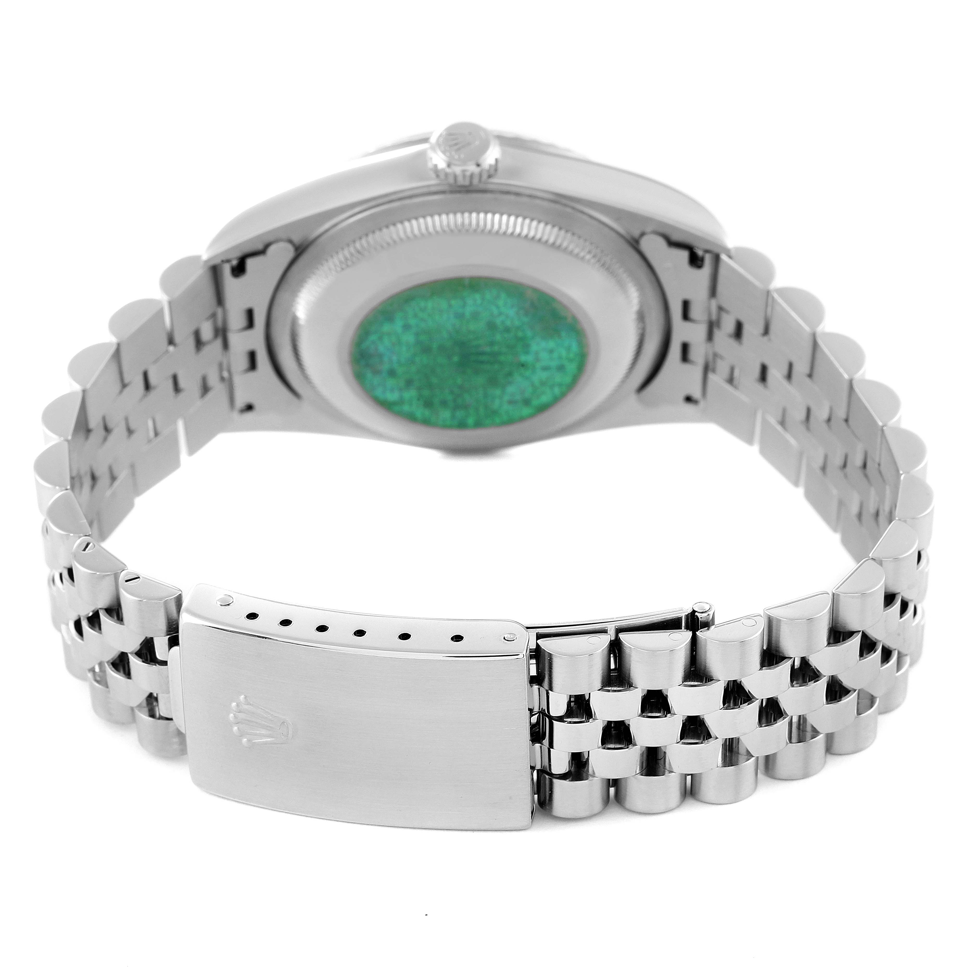 The image shows the back view of a Rolex Datejust 16234 Men's Stainless Steel Blue Dial 16234 Men's Stainless Steel Blue Dial watch, highlighting the caseback and Jubilee bracelet with the clasp open.